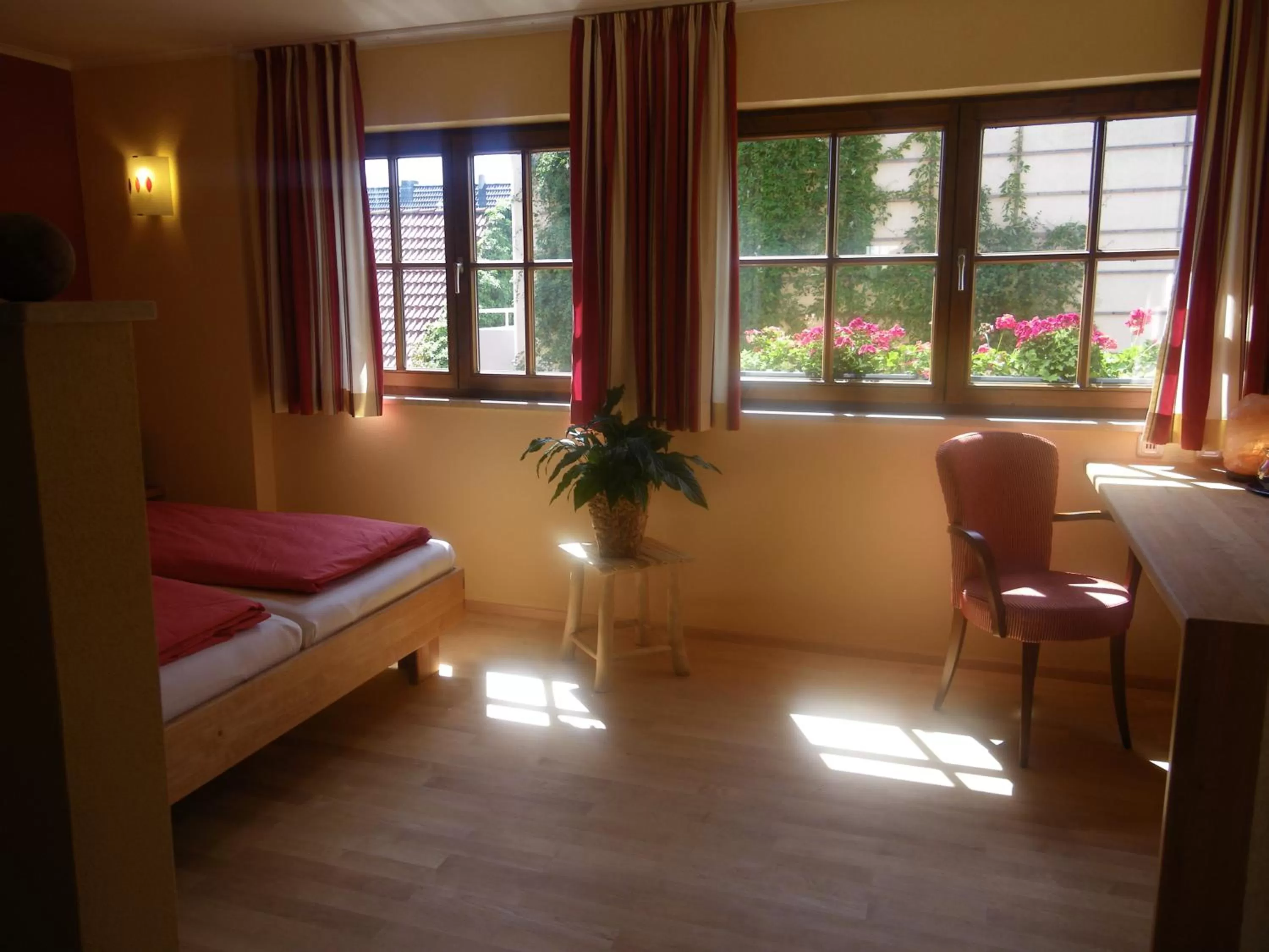 Photo of the whole room, Bed in BIO Hotel Bayerischer Wirt Augsburg