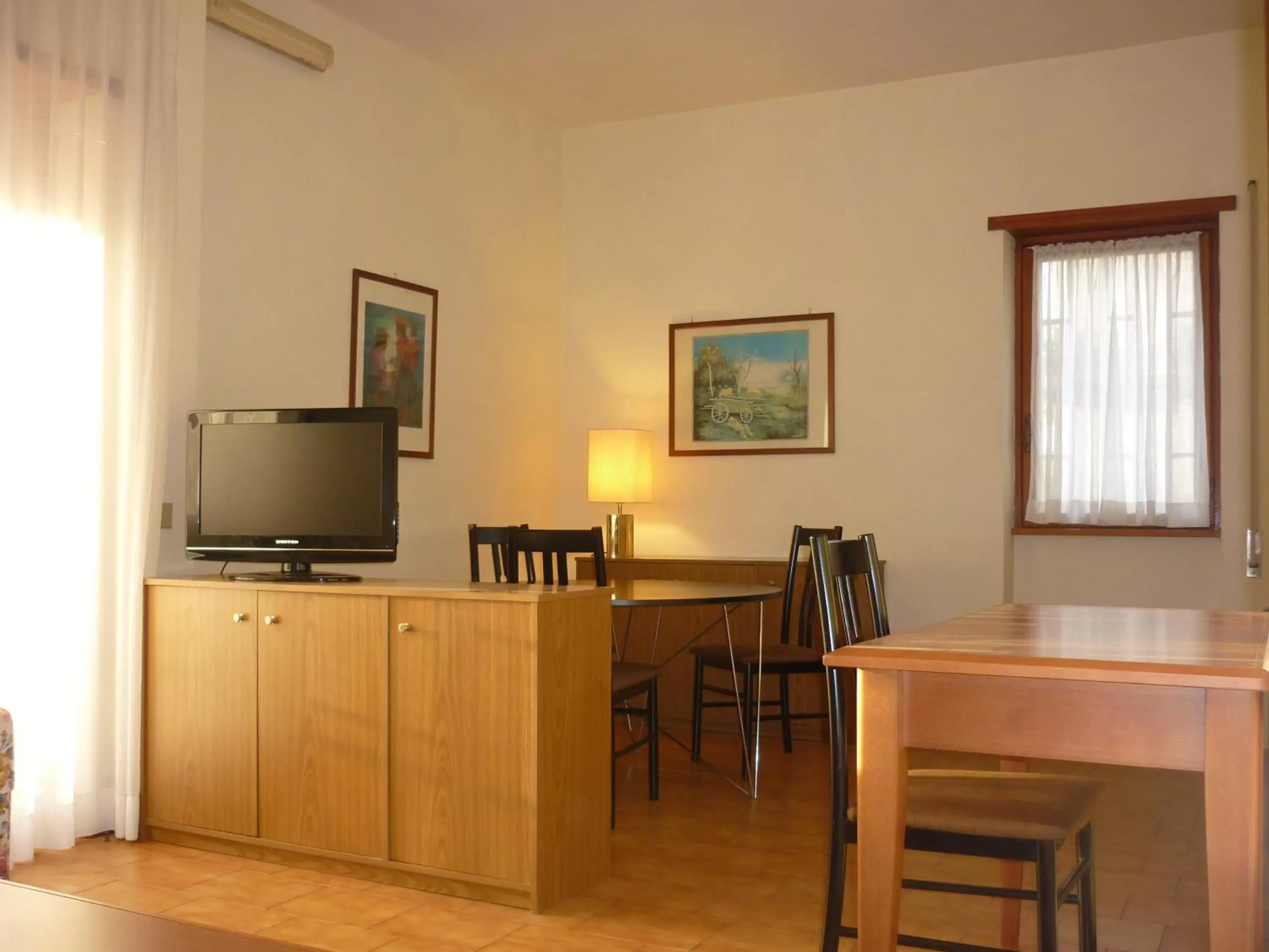 Photo of the whole room, TV/Entertainment Center in Eur Nir Residence