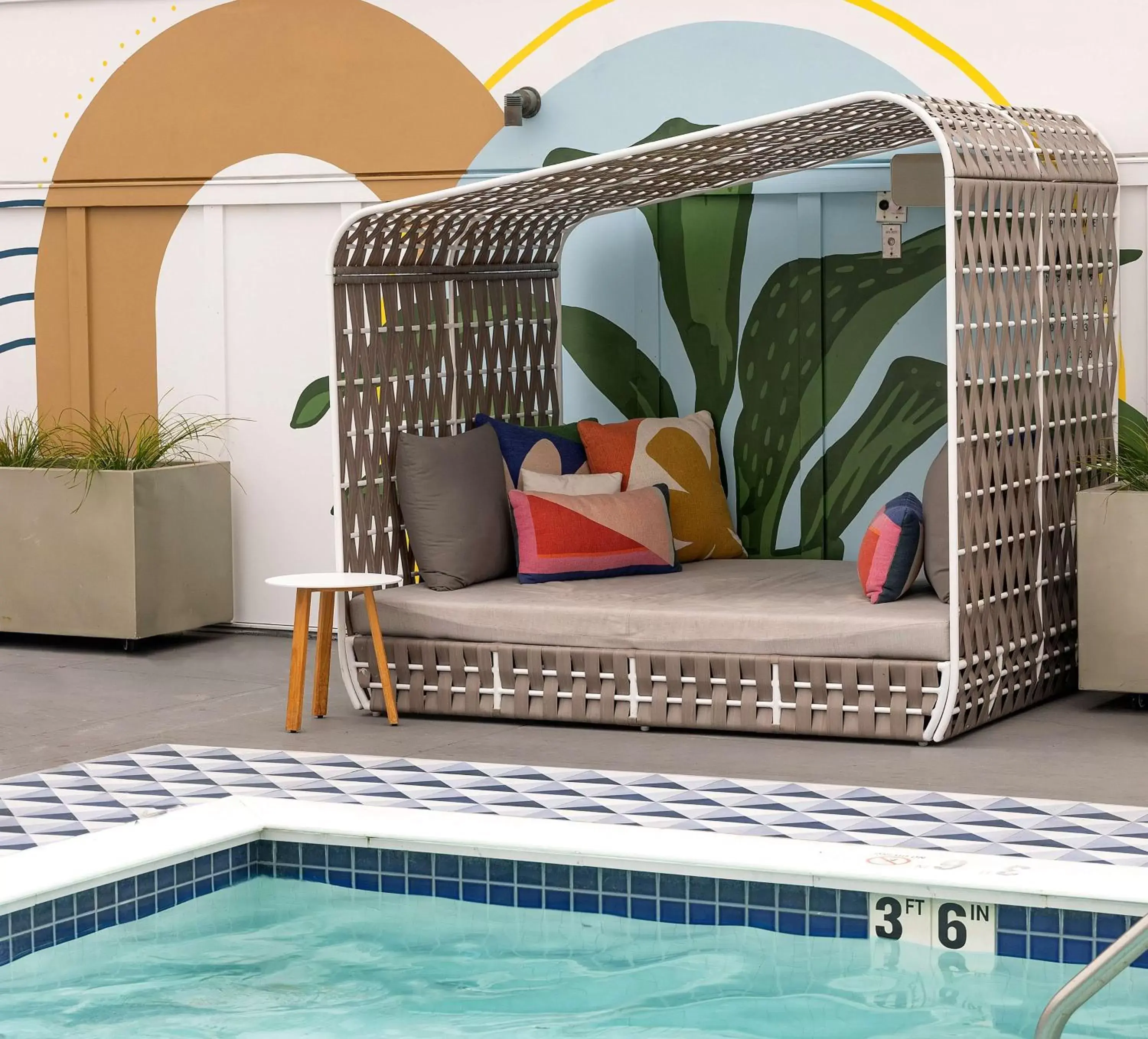 Seating area, Swimming Pool in Inn at the Pier Pismo Beach, Curio Collection by Hilton
