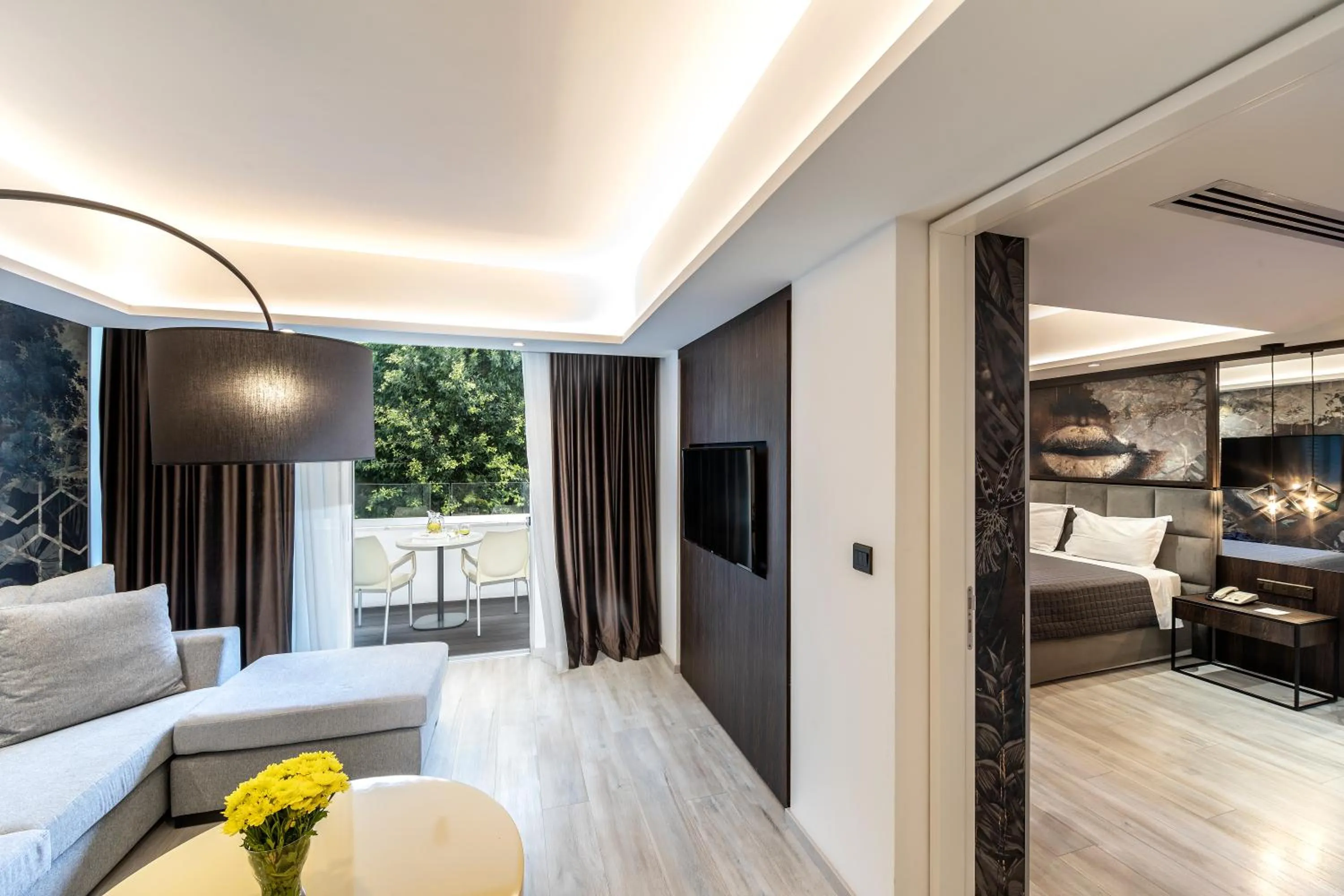 Living room, Bed in Almond Business Hotel