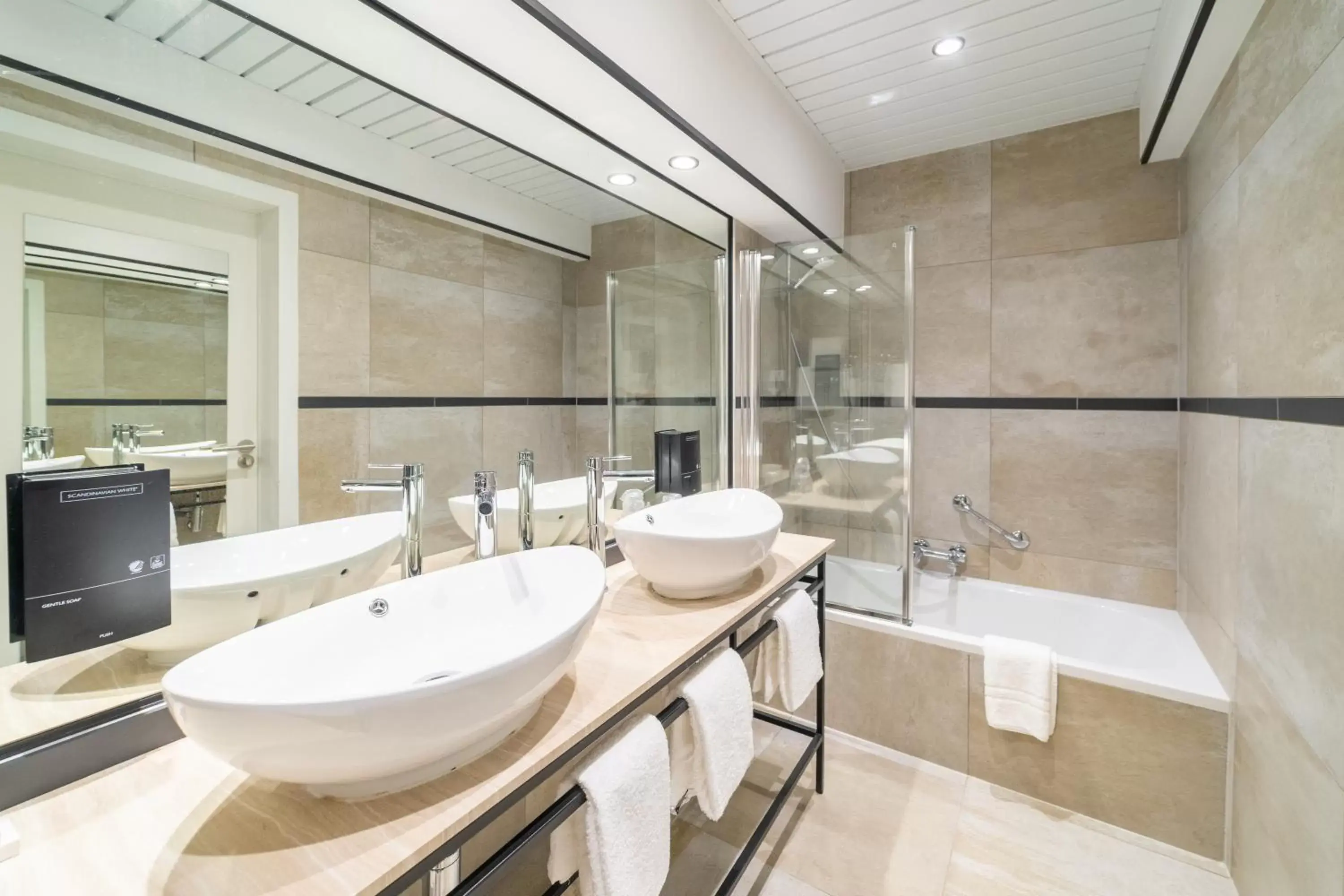 Bathroom in Grand Hotel Normandy by CW Hotel Collection