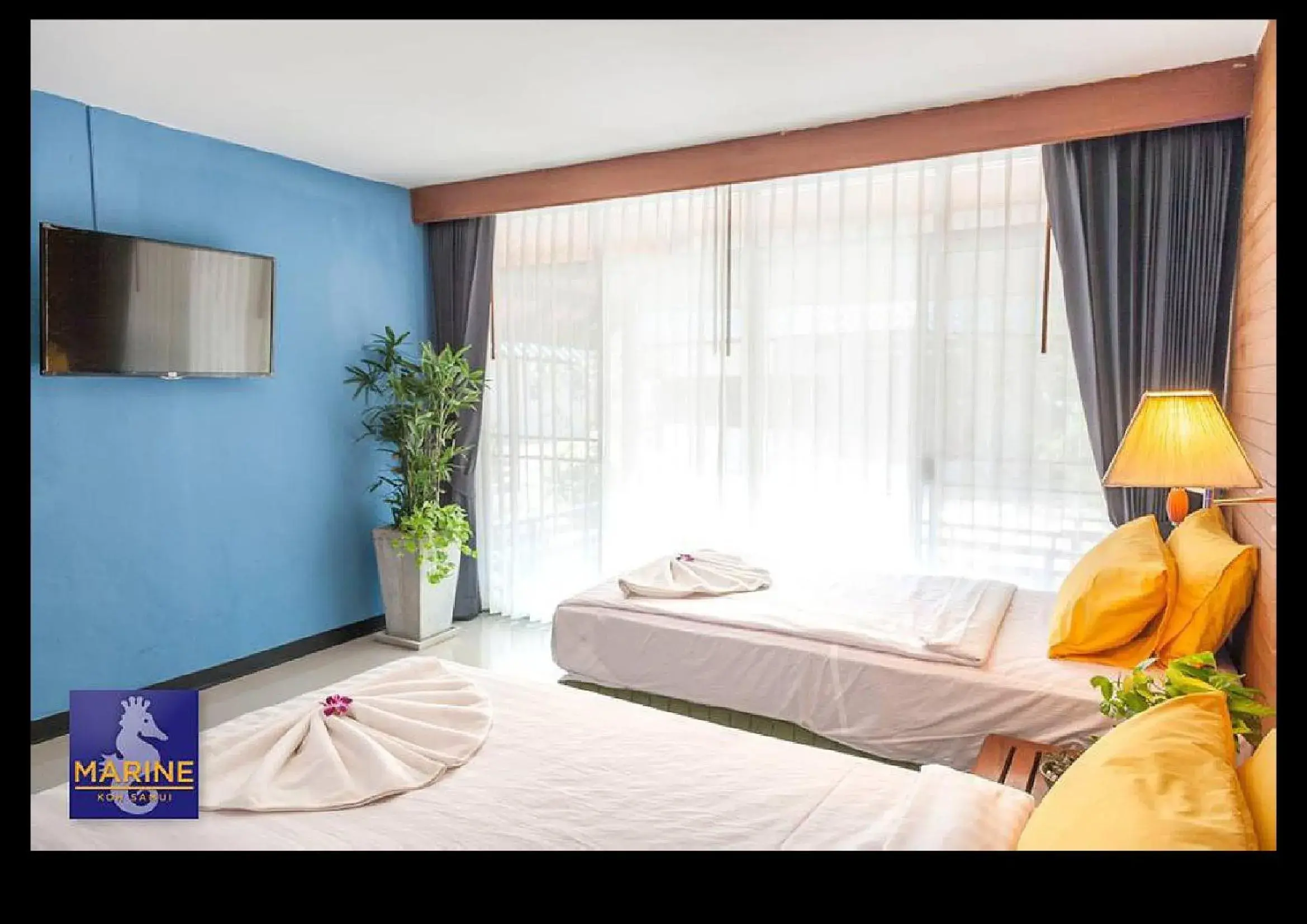 Bed in Marine Chaweng Beach Resort Bed in Marine Chaweng Beach Resort