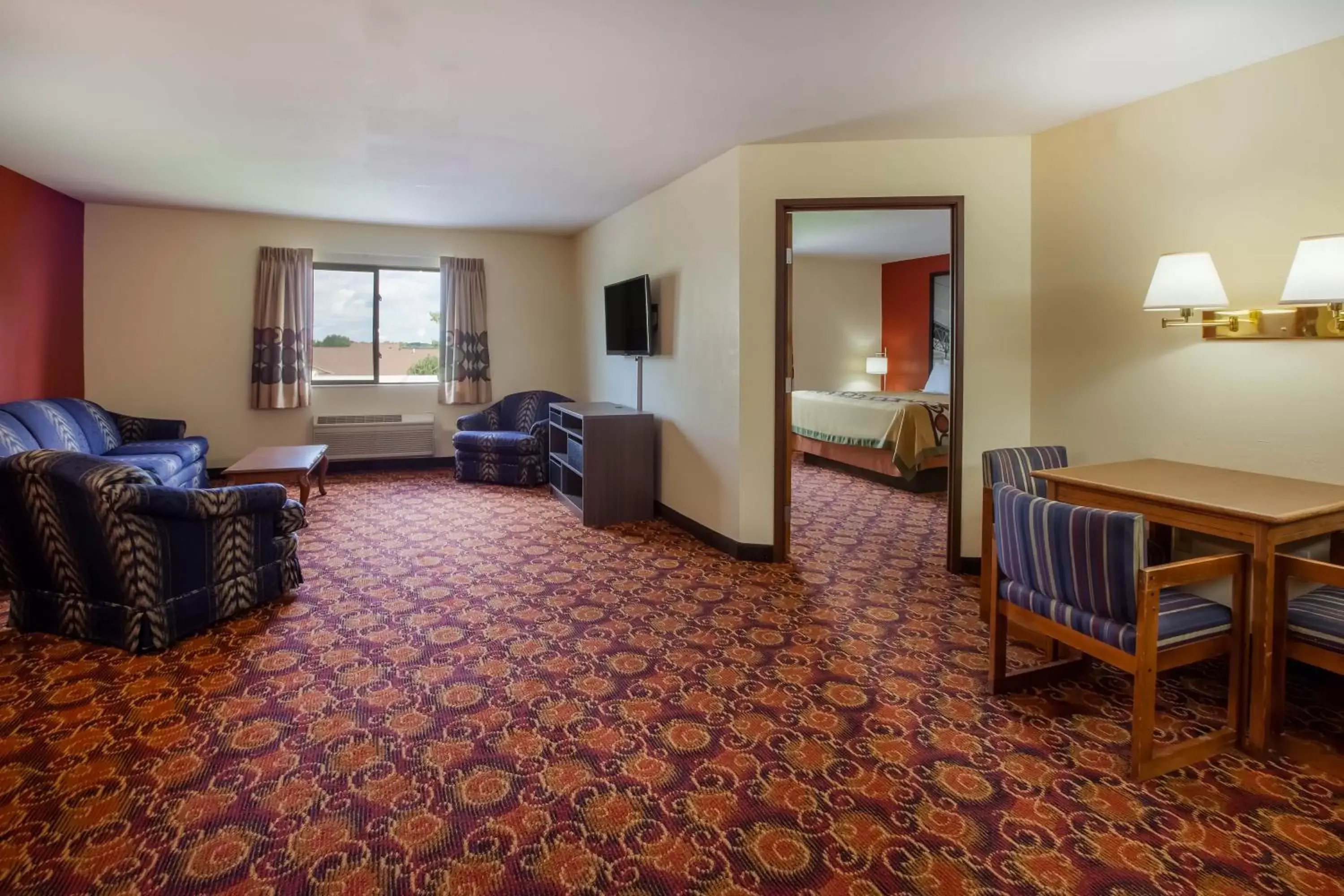 Photo of the whole room, Seating Area in Super 8 by Wyndham Big Rapids