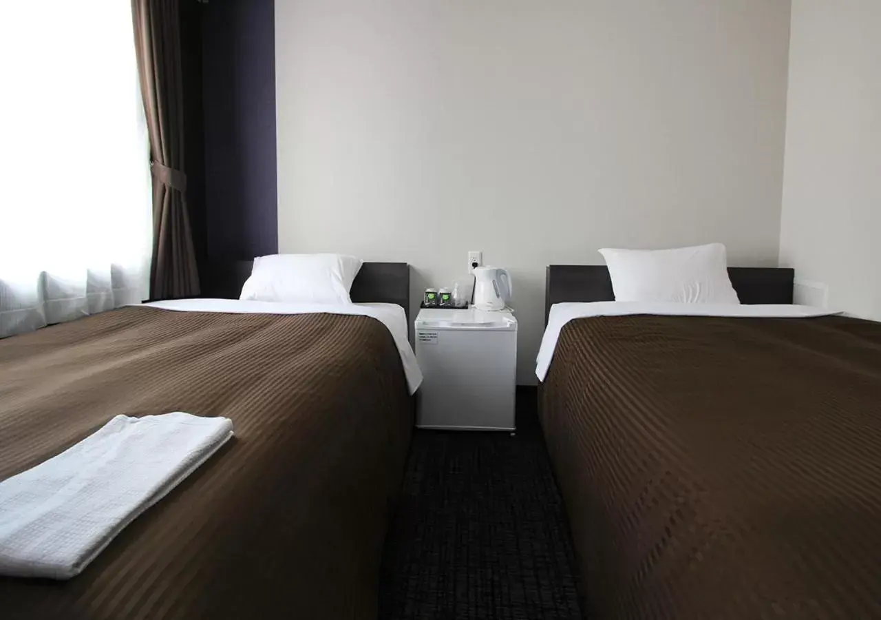 Photo of the whole room, Bed in Hotel Trend Okazaki Ekimae