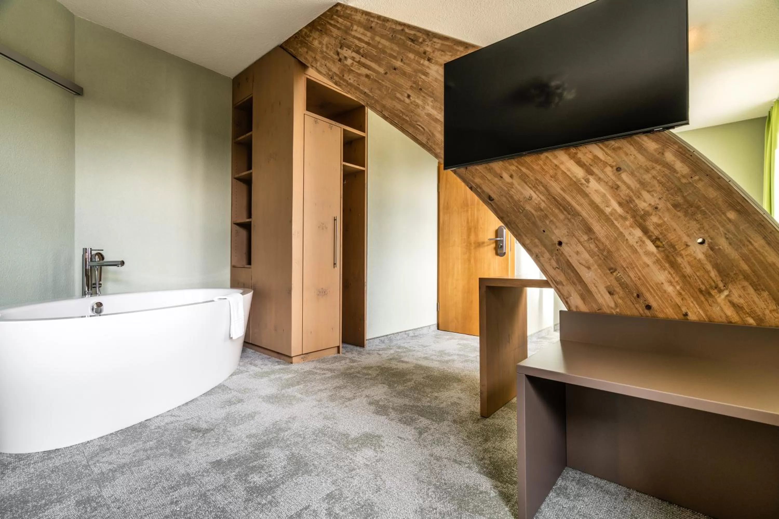 Bathroom, TV/Entertainment Center in flexymotel Schönenwerd