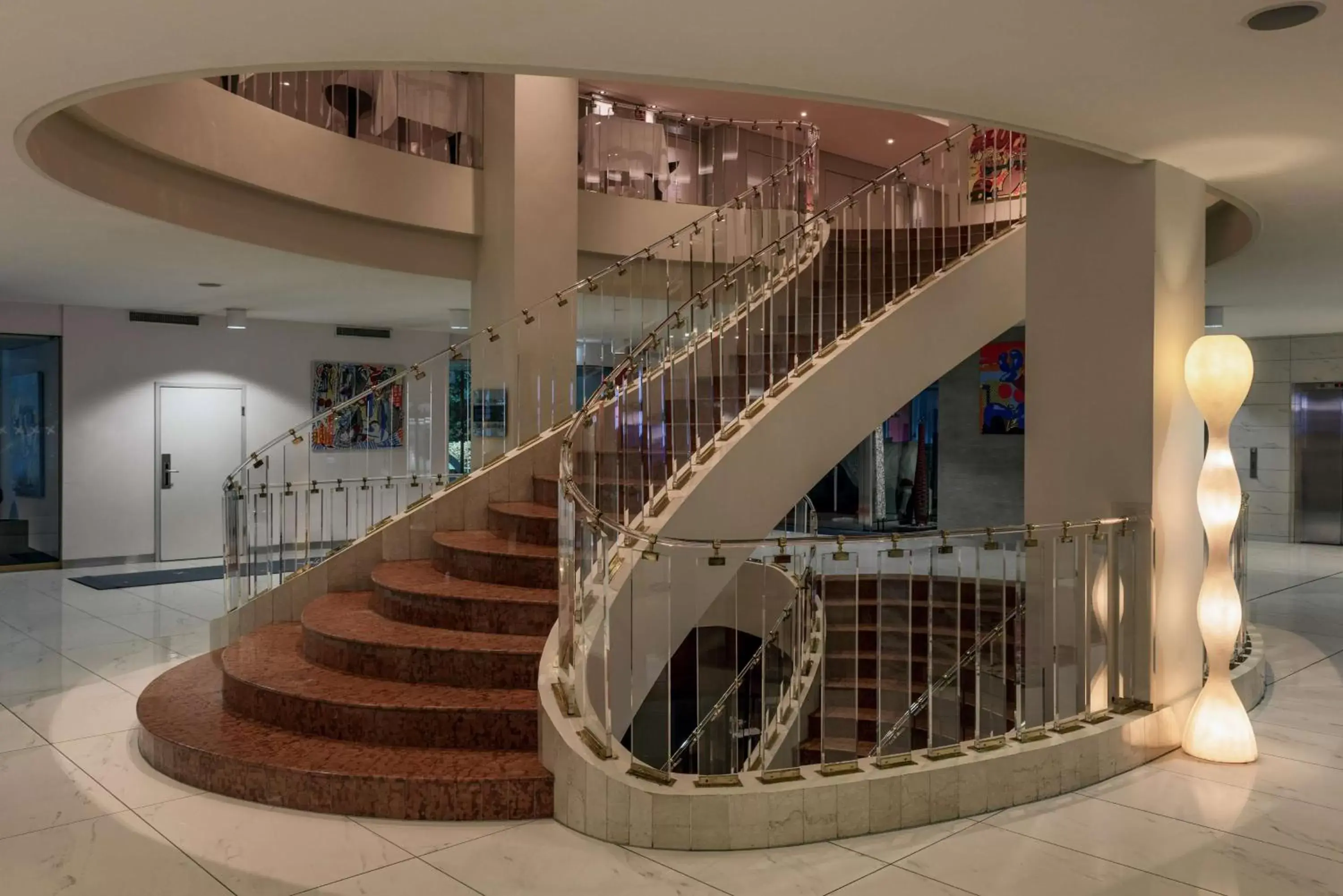 Lobby or reception in Hilton Geneva Hotel and Conference Centre Lobby or reception in Hilton Geneva Hotel and Conference Centre