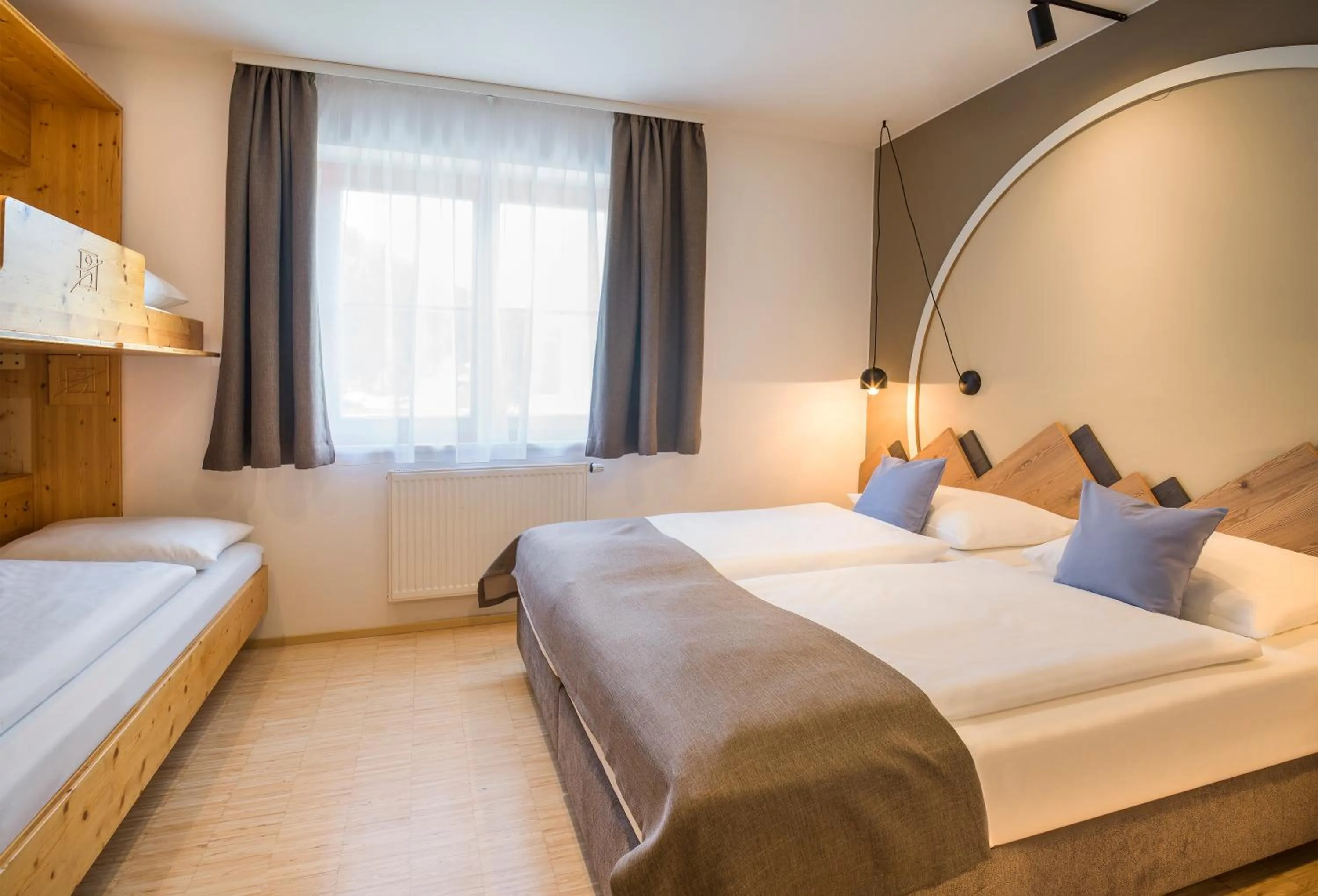 Photo of the whole room, Bed in JUFA Hotel Wipptal