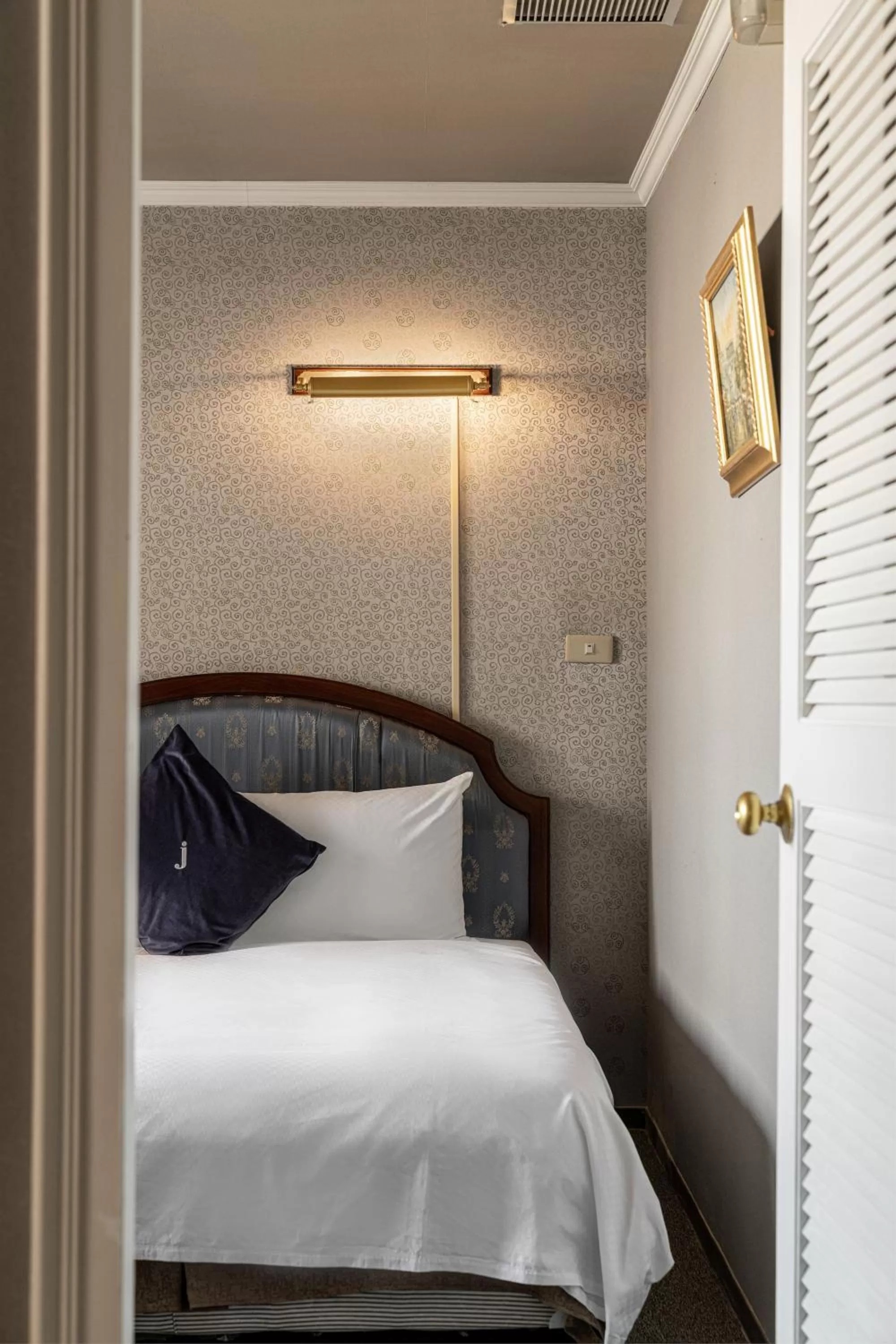 Bed in Hotel j-Metropolis