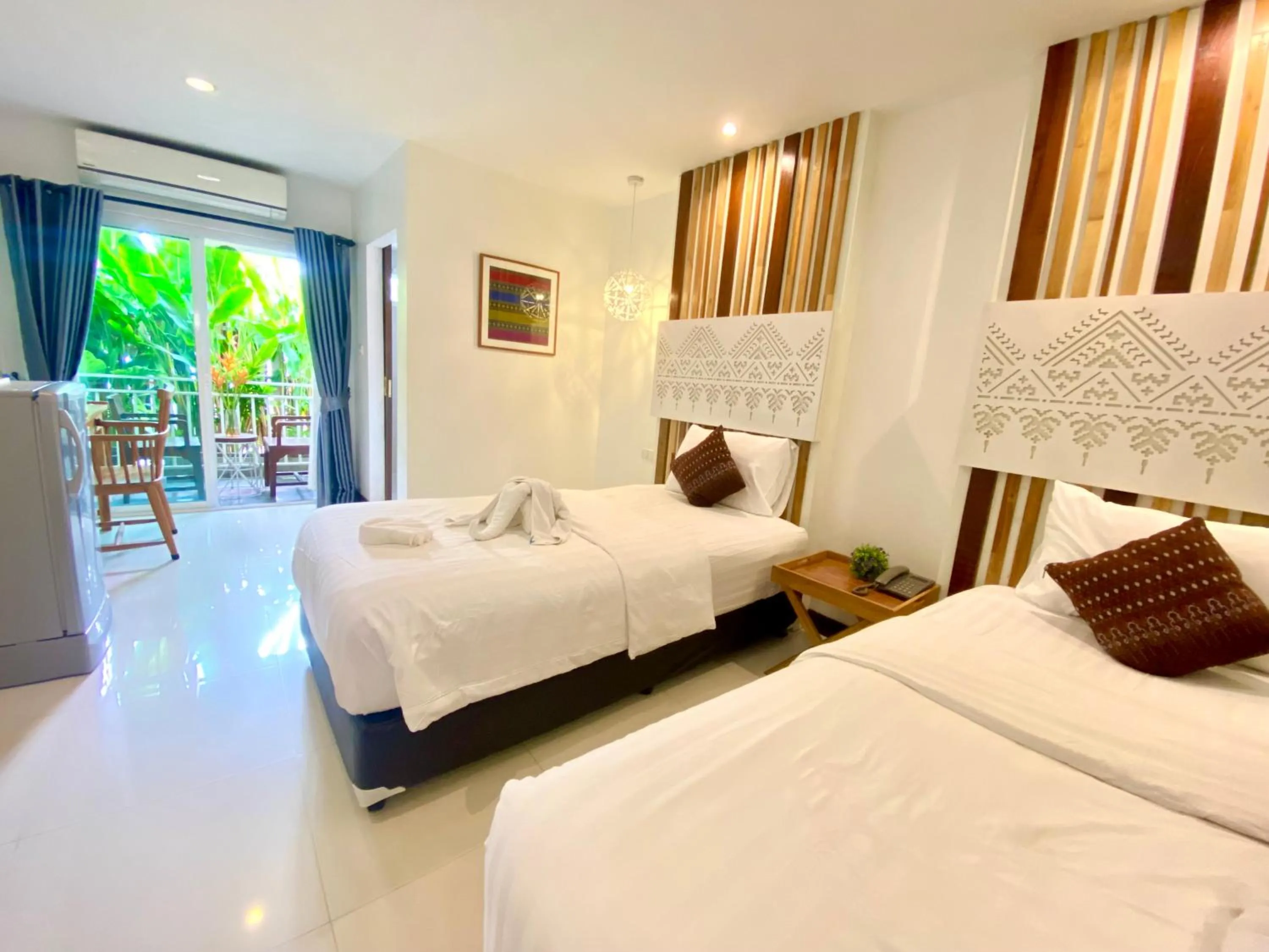 Bed in My Chiangmai Boutique Lodge