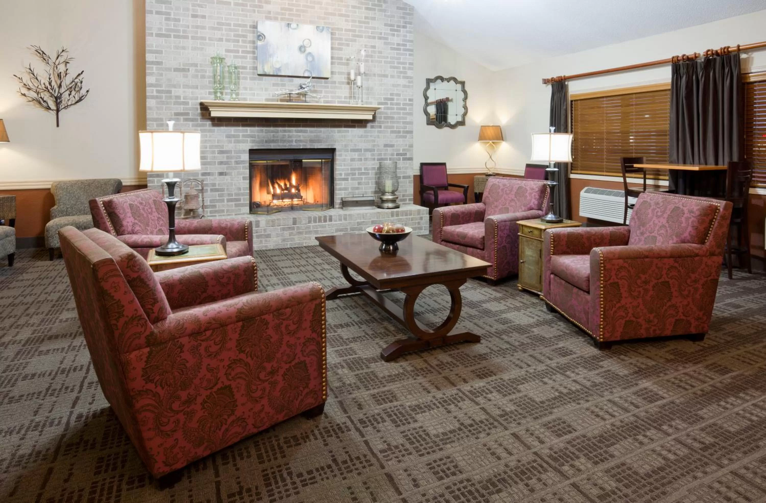 Lobby or reception in AmericInn by Wyndham Osceola