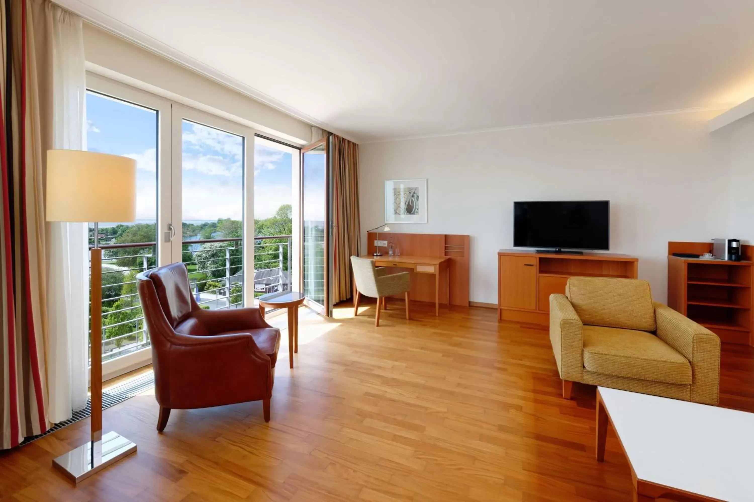 Bedroom, Seating Area in ATLANTIC Hotel Wilhelmshaven