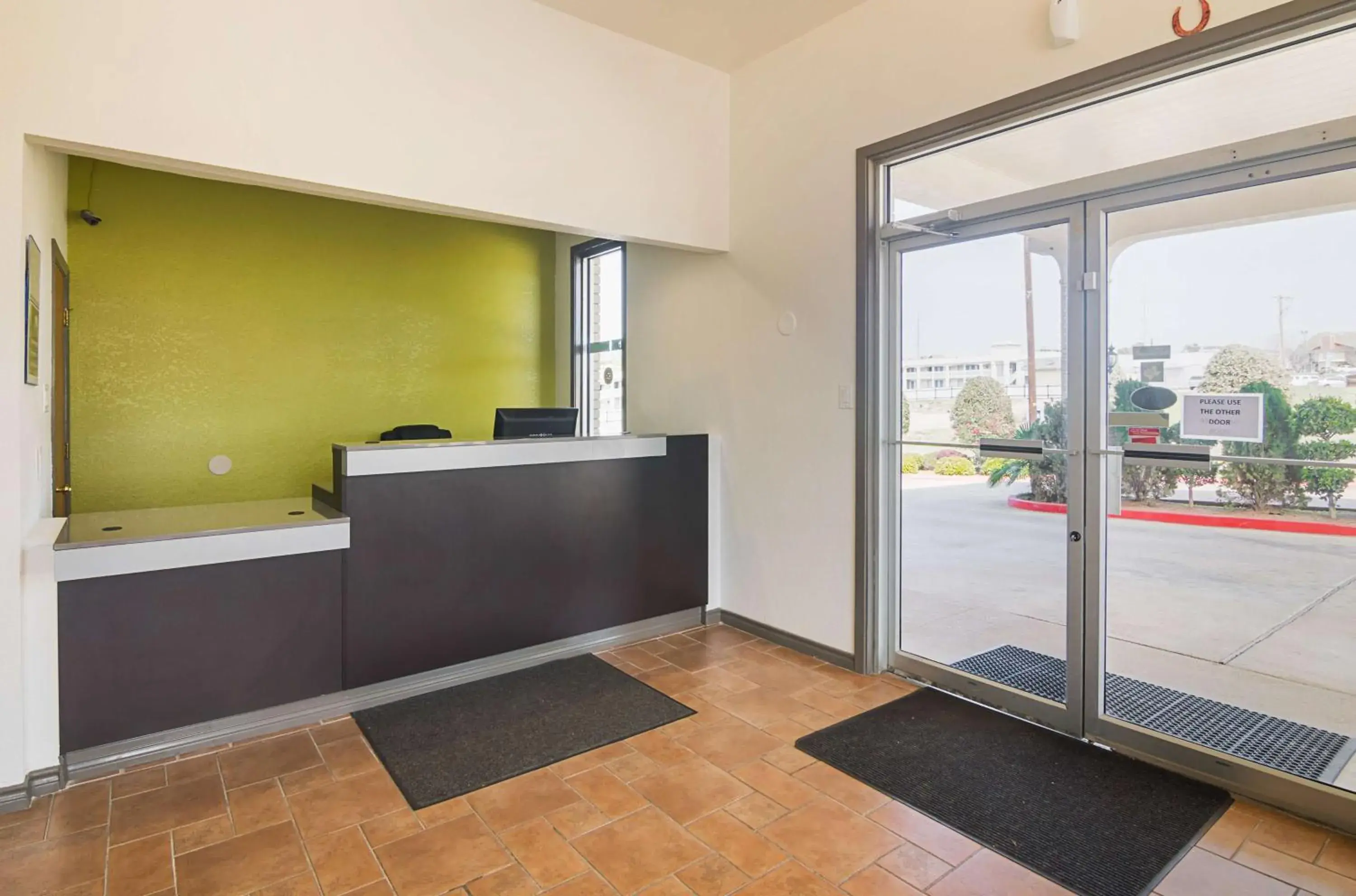 Lobby or reception in Studio 6-Tyler, TX Lobby or reception in Studio 6-Tyler, TX