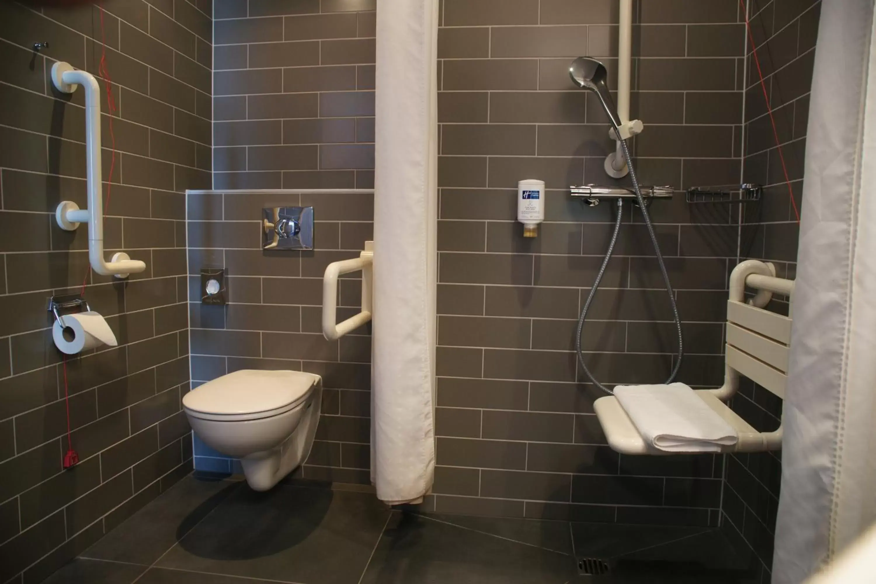 Photo of the whole room, Bathroom in Holiday Inn Express Zürich Airport, an IHG Hotel