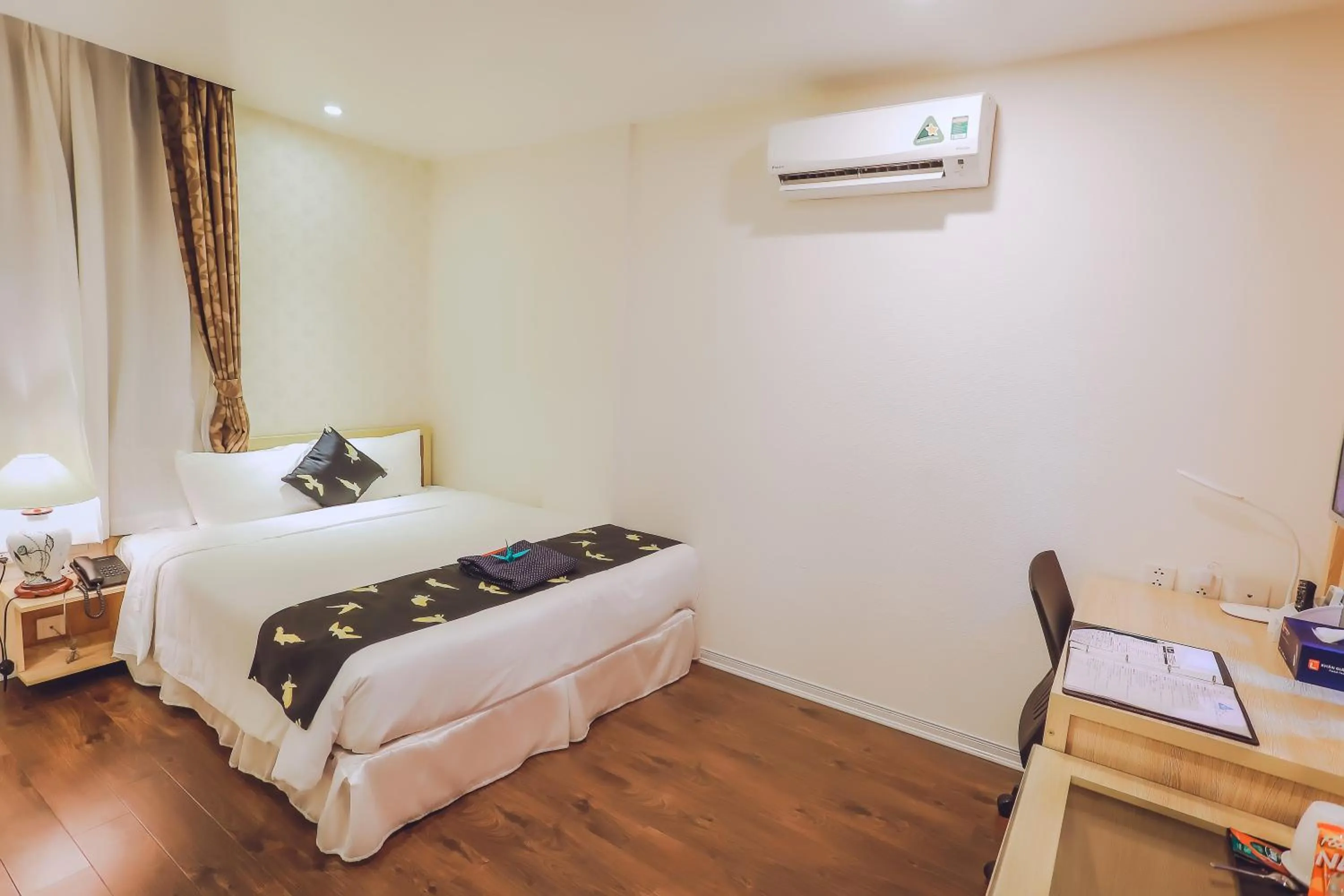 Bed in Momizi Business Hotel