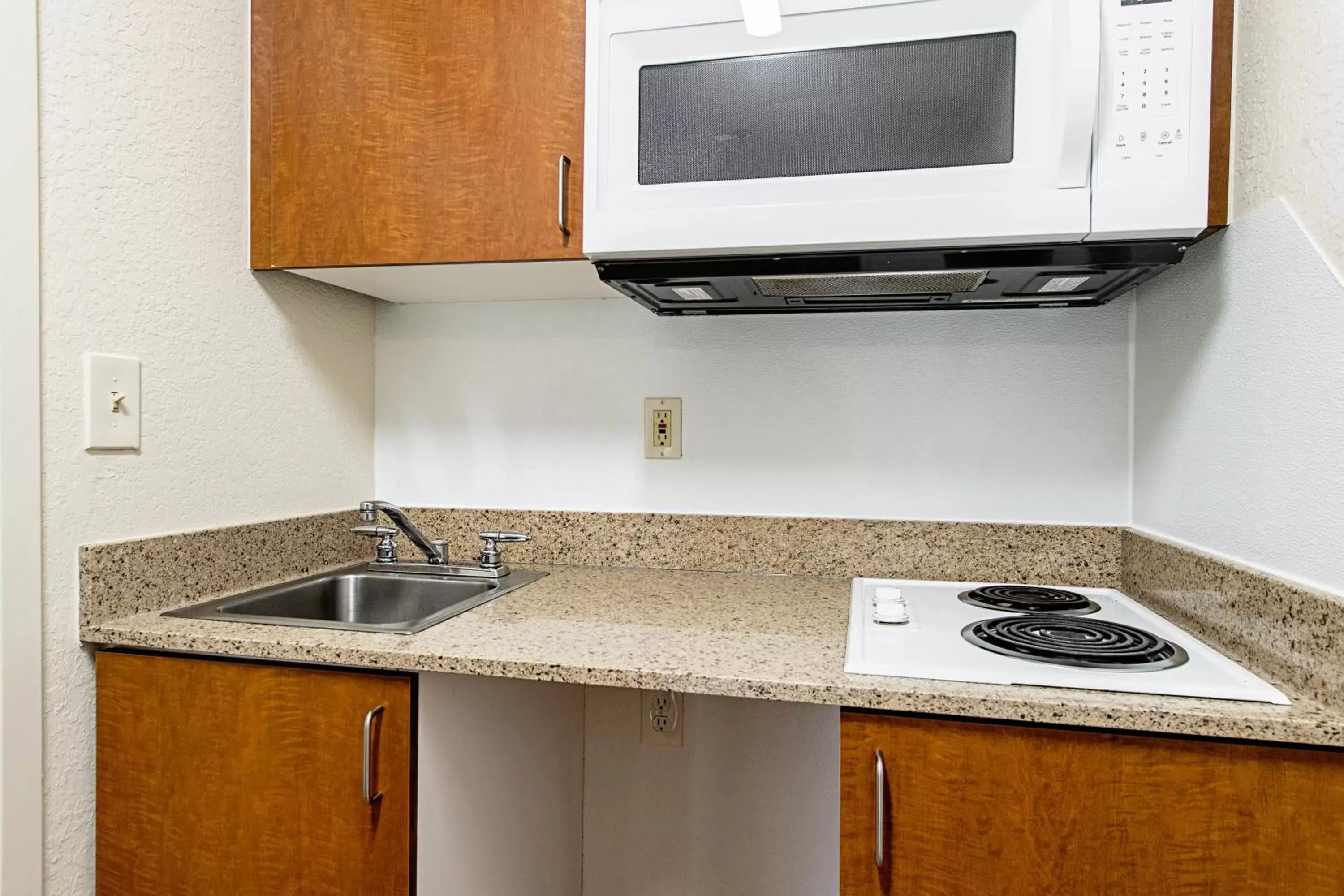 Photo of the whole room, Kitchen/Kitchenette in HomeTowne Studios by Red Roof Tacoma - Puyallup