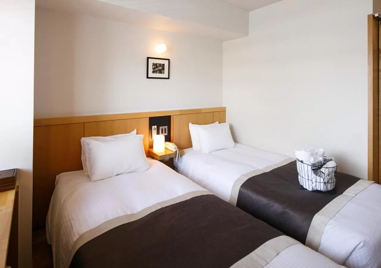 Bed in Sutton Place Hotel Ueno