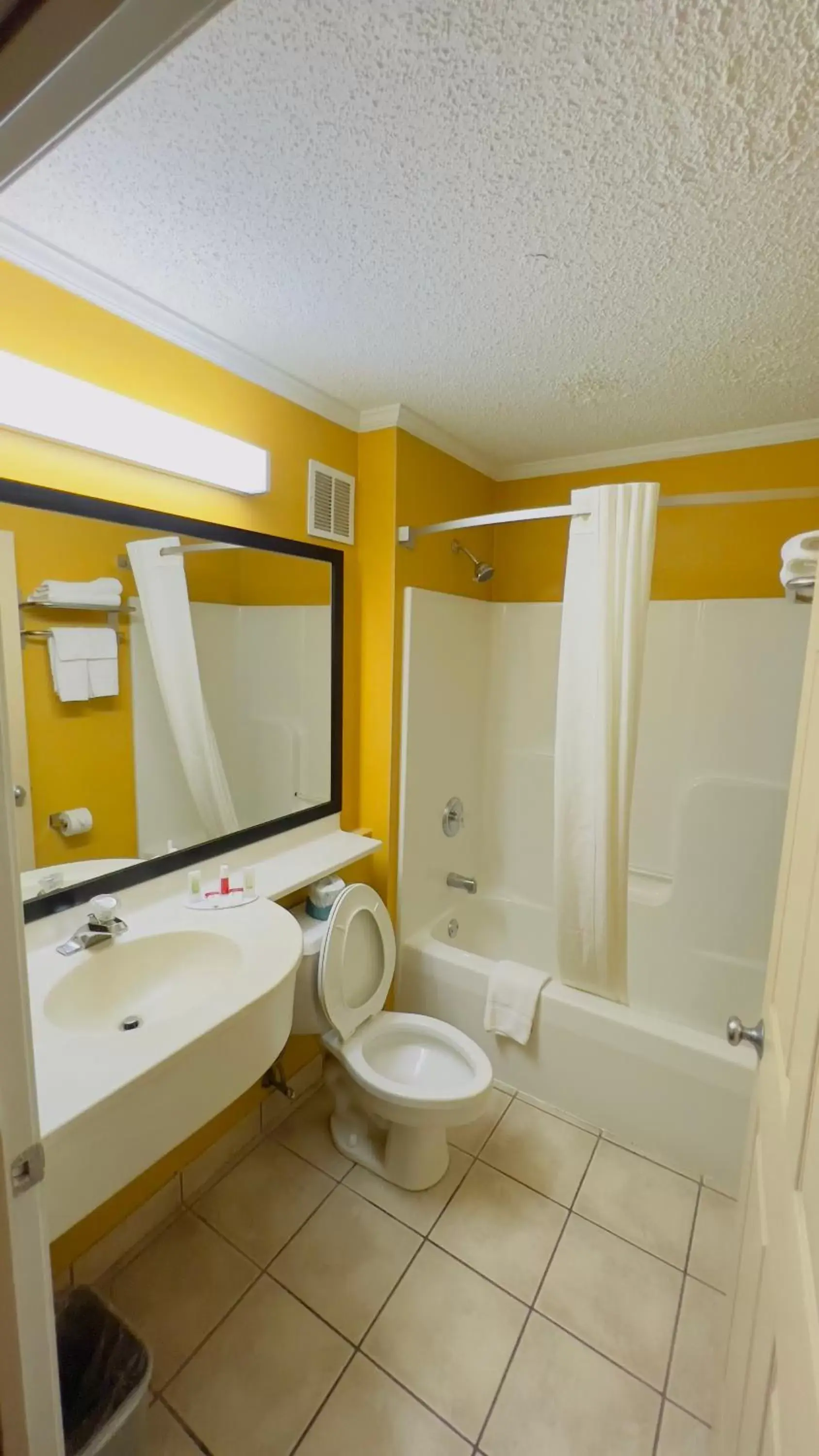 Bathroom in Super 8 by Wyndham Maumee Perrysburg Toledo Area