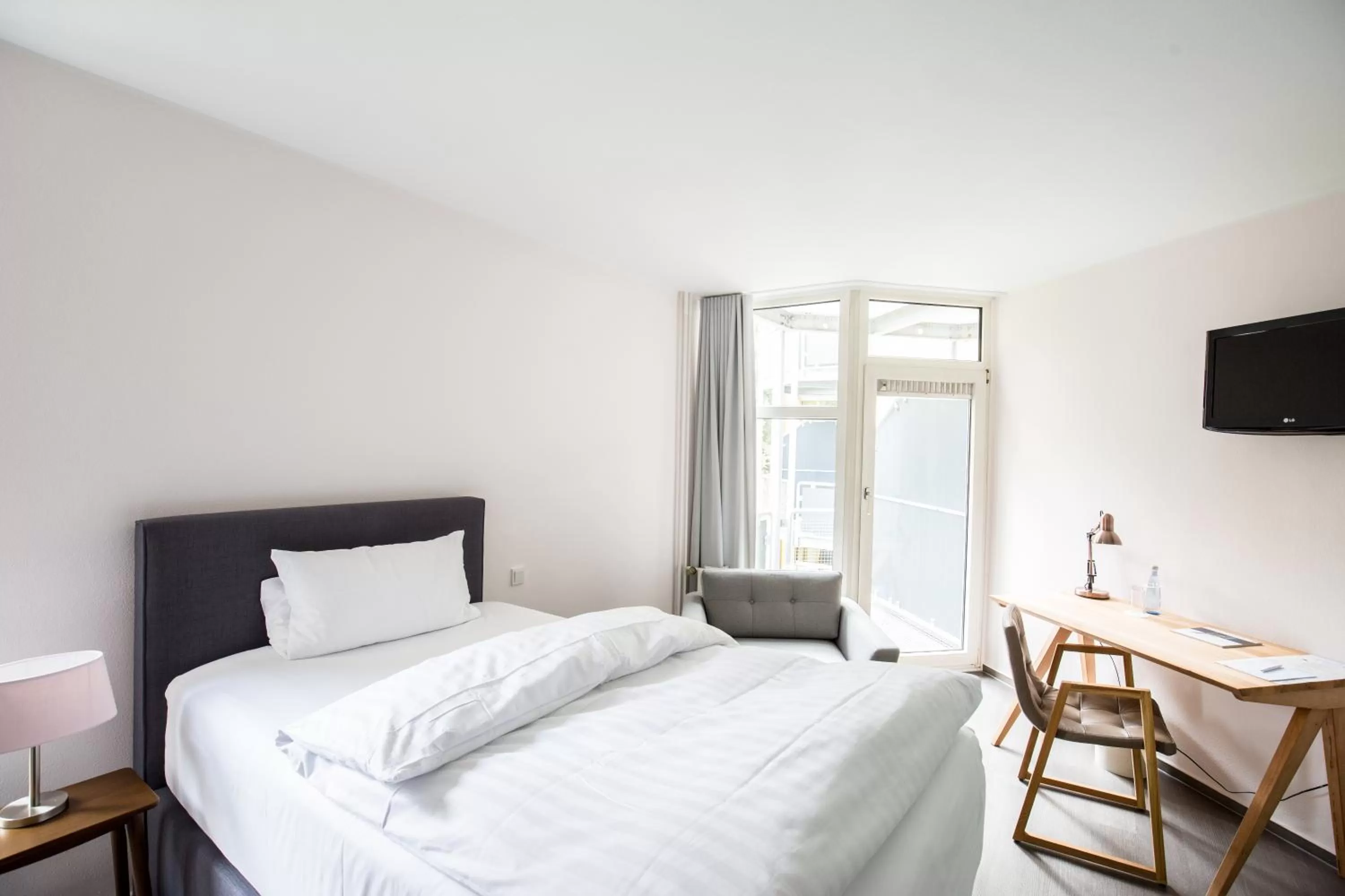 Photo of the whole room, Bed in Wald & Golfhotel Lottental