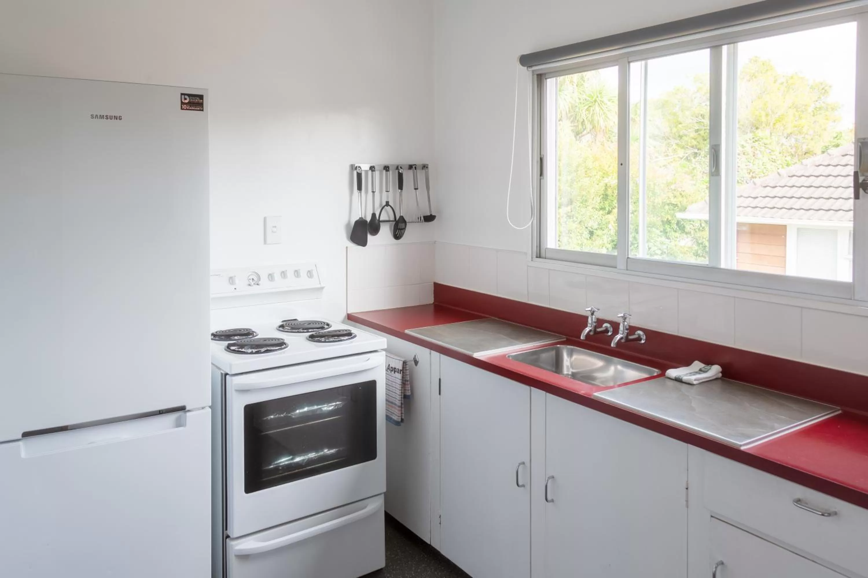 Kitchen or kitchenette in New Haven Motel