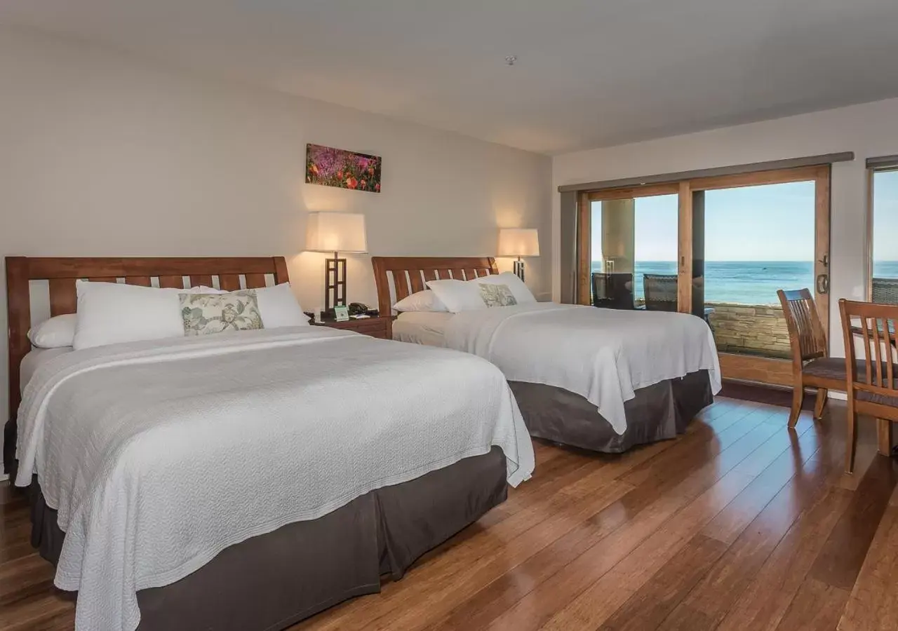 Deluxe Queen Room with Two Queen Beds with Ocean View in Moonstone Landing