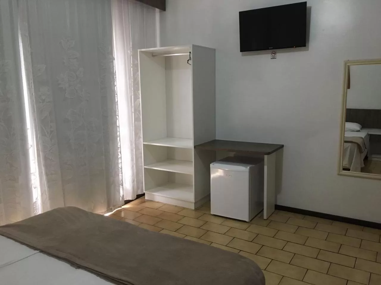 TV/Entertainment Center in Hotel Luz do Sol