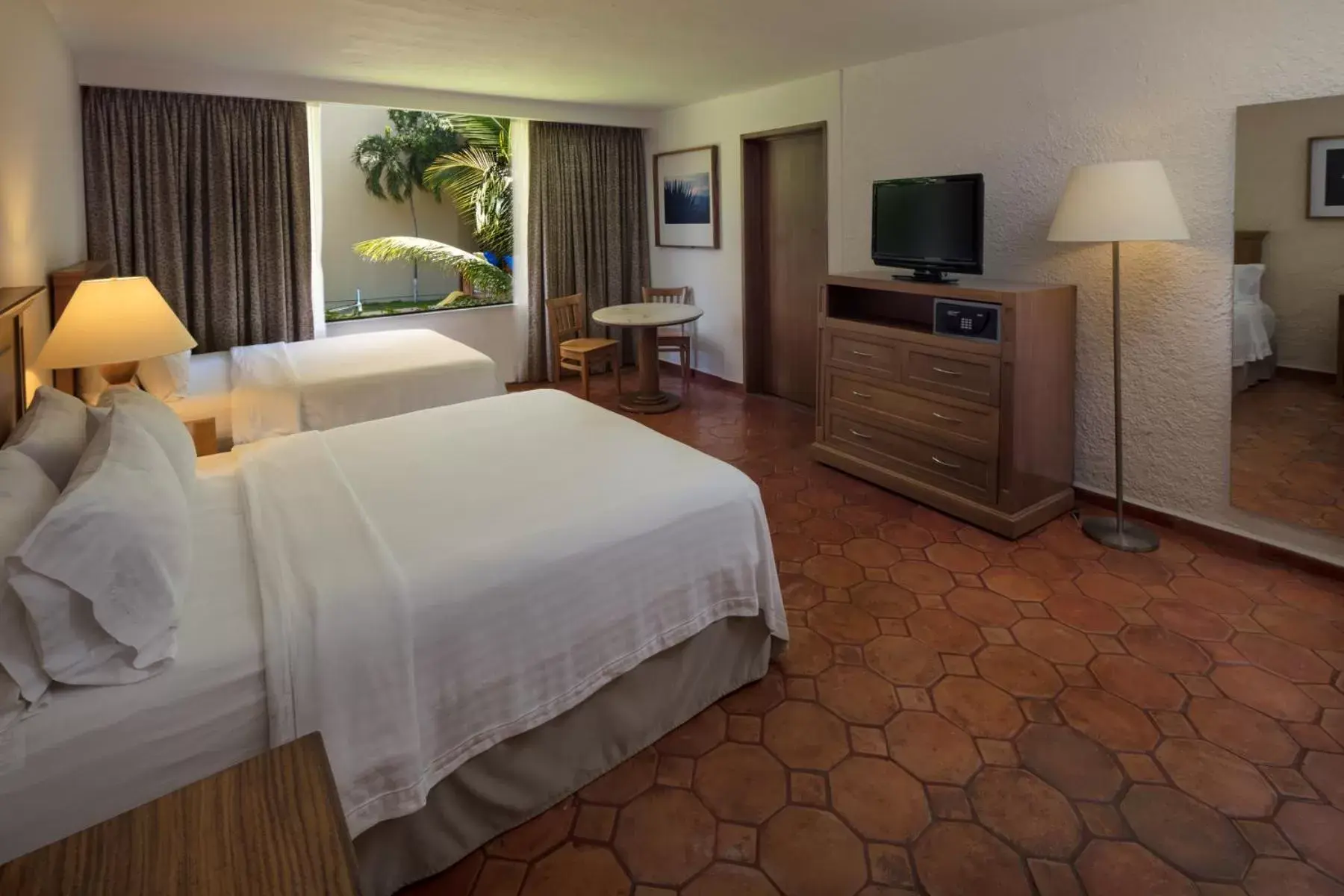 Photo of the whole room, Bed in Holiday Inn Resort Ixtapa All-Inclusive, an IHG Hotel