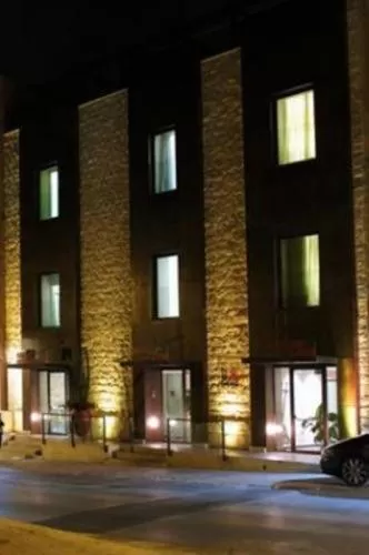 Facade/entrance in El Homs Palace Hotel