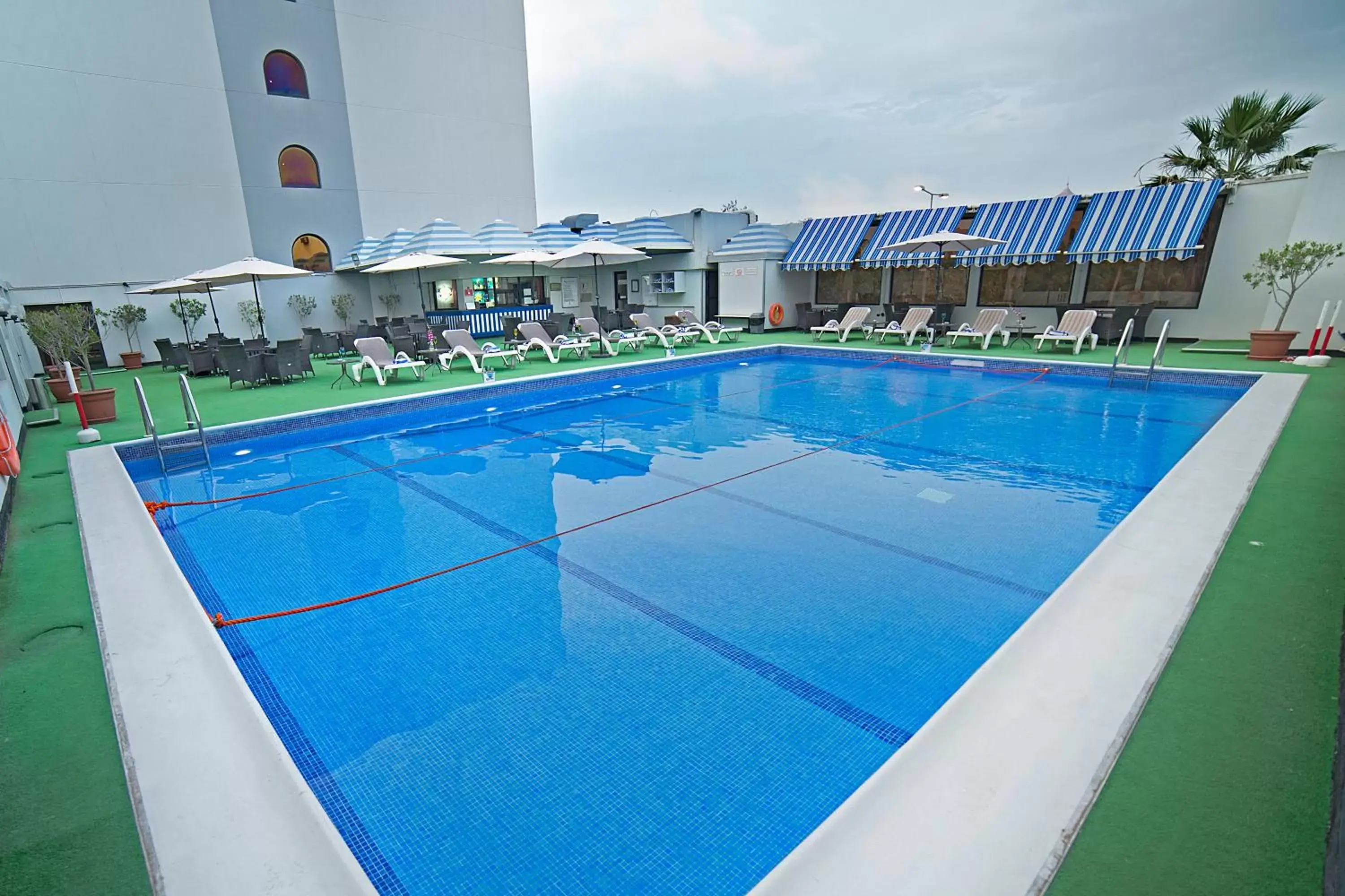 Food, Swimming Pool in Ramada by Wyndham Bahrain