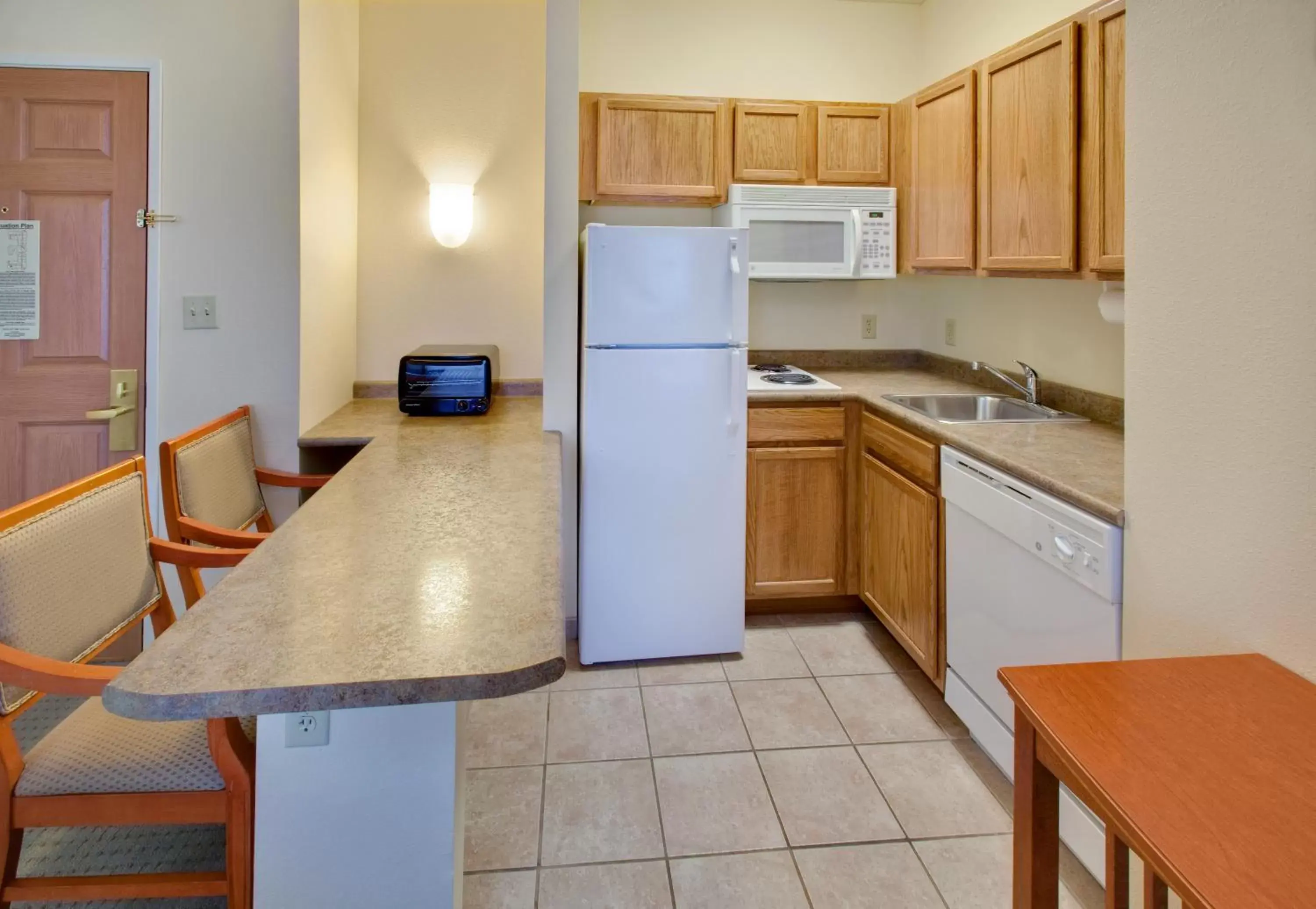 Kitchen/Kitchenette in Staybridge Suites Fargo, an IHG Hotel