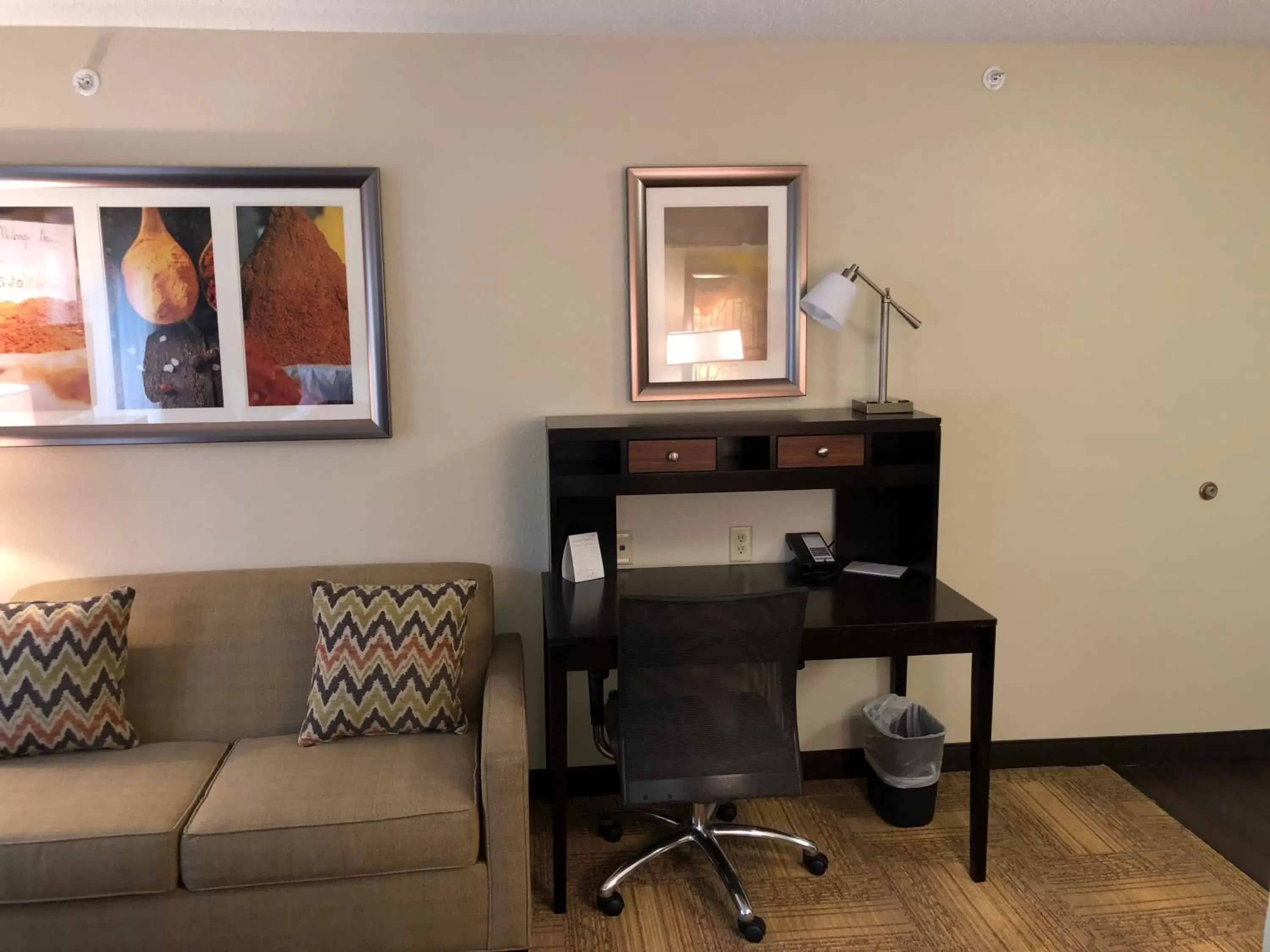 Living room, Seating Area in Staybridge Suites Grand Rapids-Kentwood, an IHG Hotel