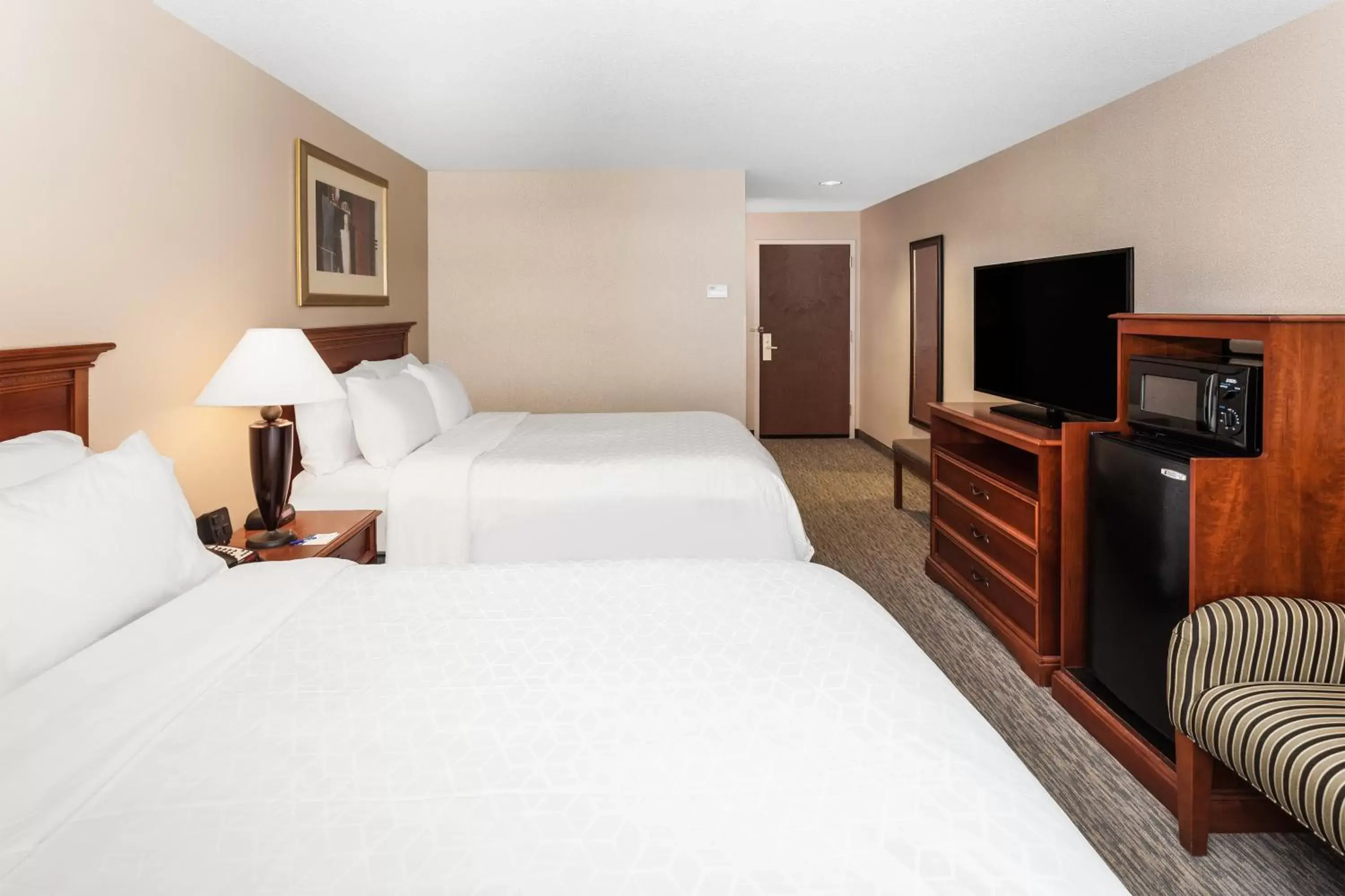 Bed in Holiday Inn Express Hotel & Suites Hampton South-Seabrook, an IHG Hotel