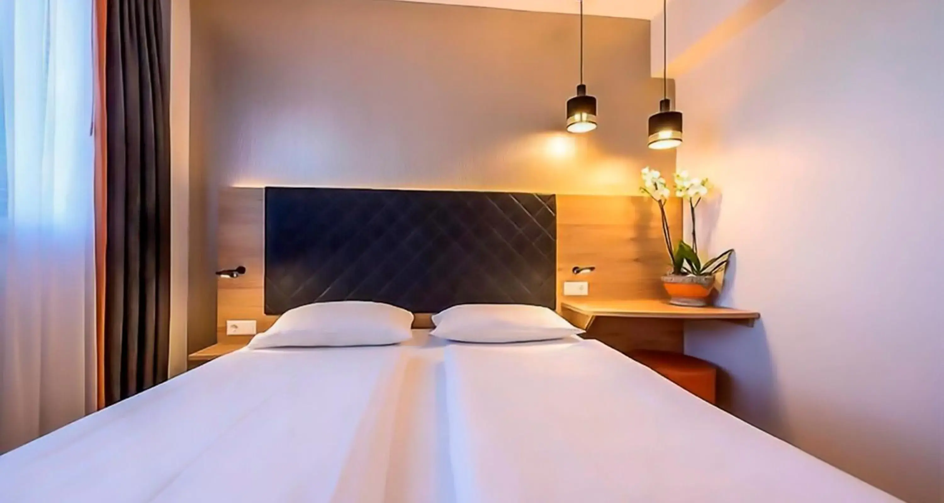 Bed in Novum Hotel Rieker Stuttgart Hauptbahnhof   