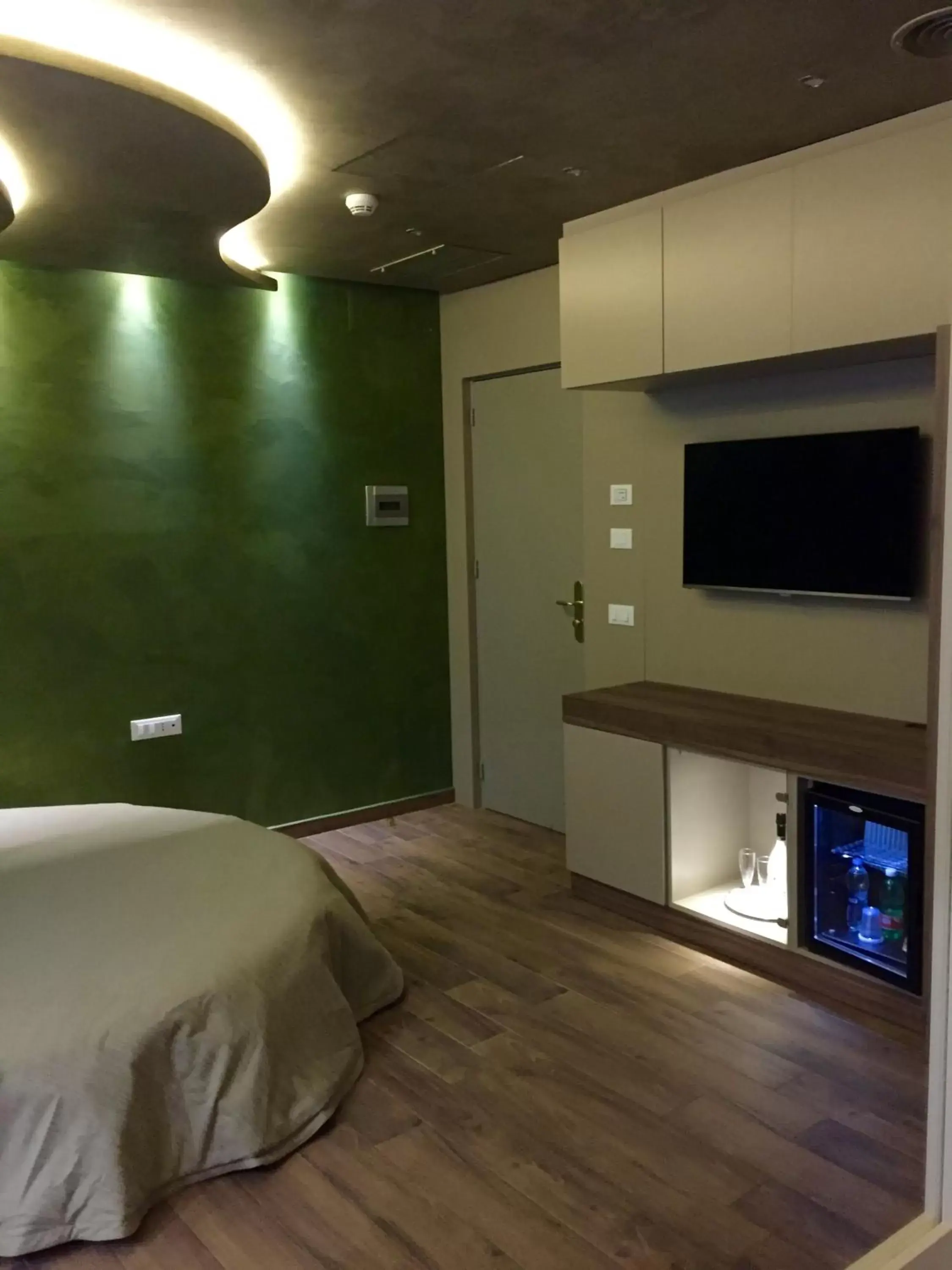 Bedroom, TV/Entertainment Center in Hotel Smeraldo