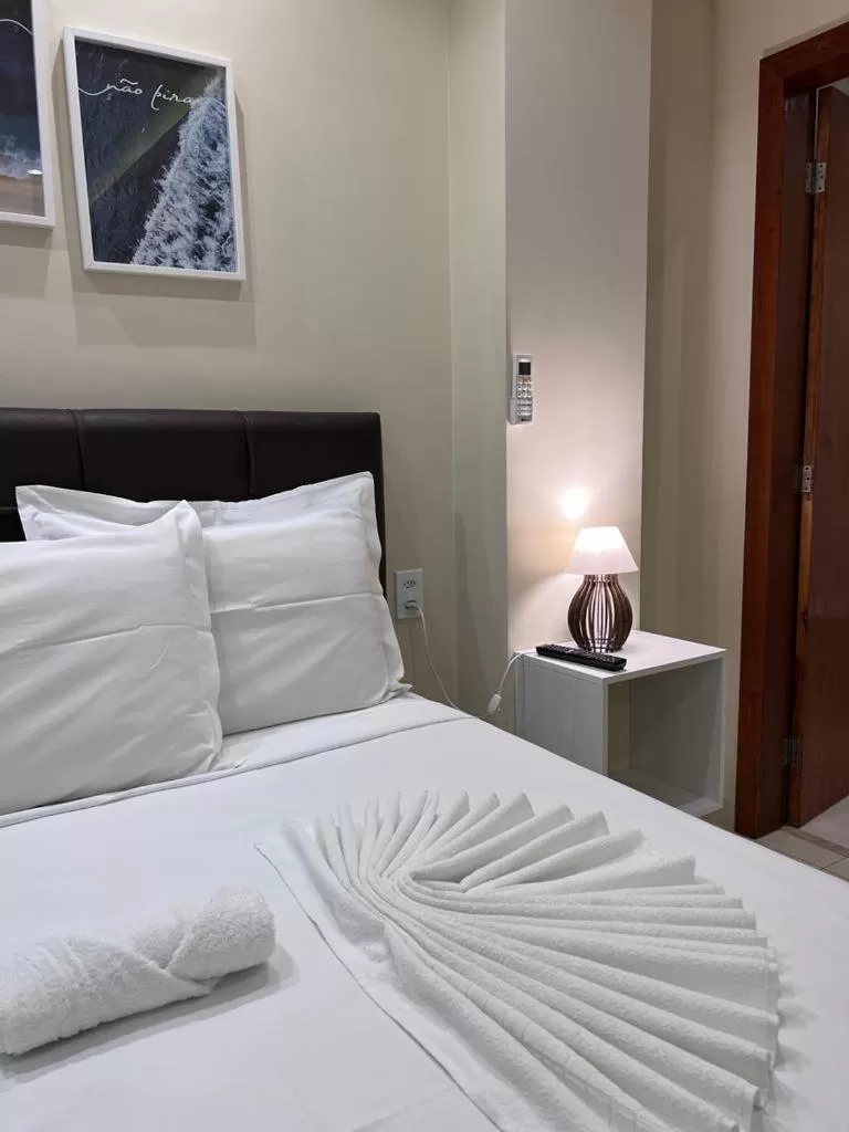 Bed in Pousada Arraial Tropical