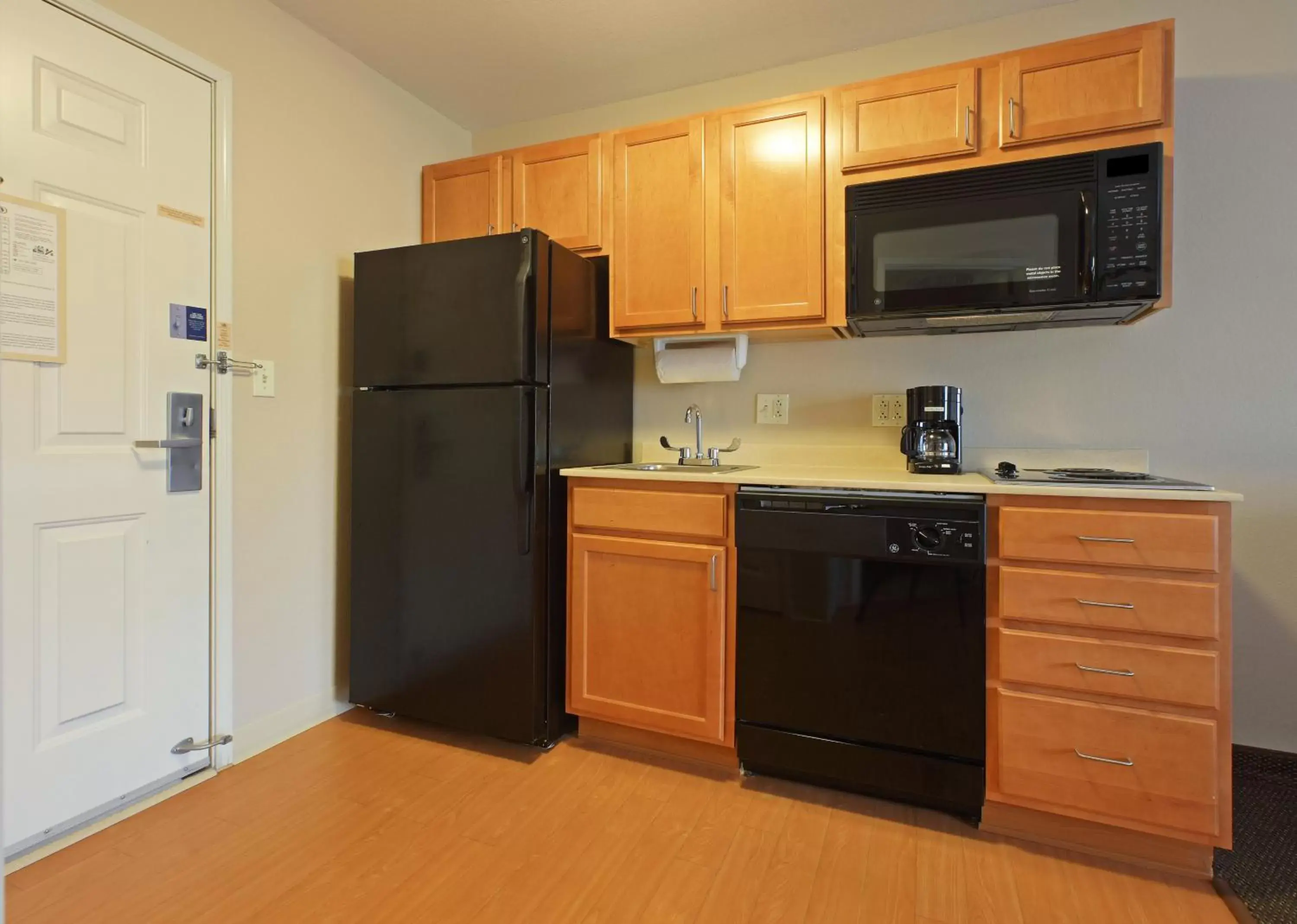 Bedroom, Kitchen/Kitchenette in Candlewood Suites Conway, an IHG Hotel