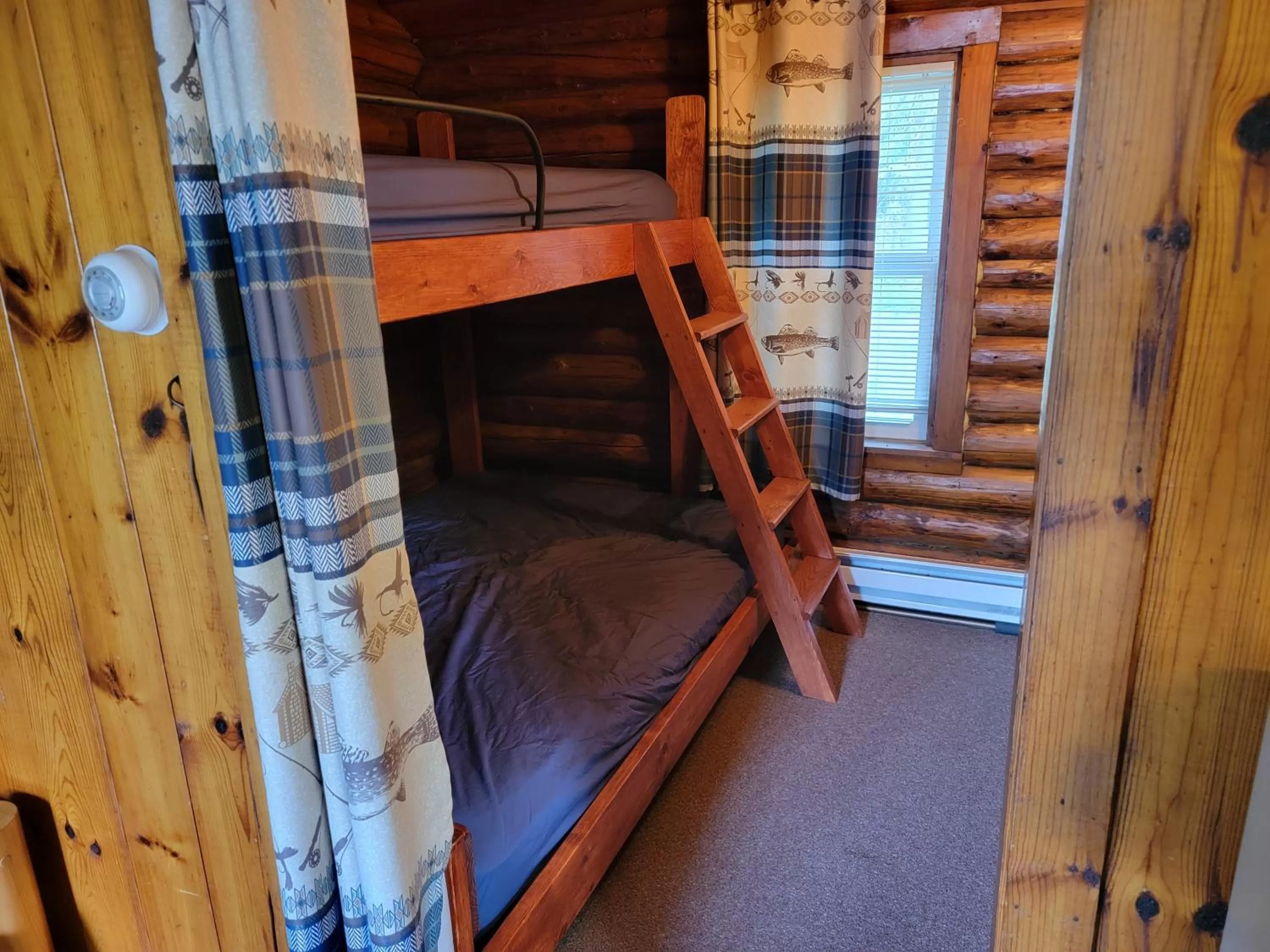 Bedroom, Bed in Two Rivers Motel and Cabins of Kenton, MI