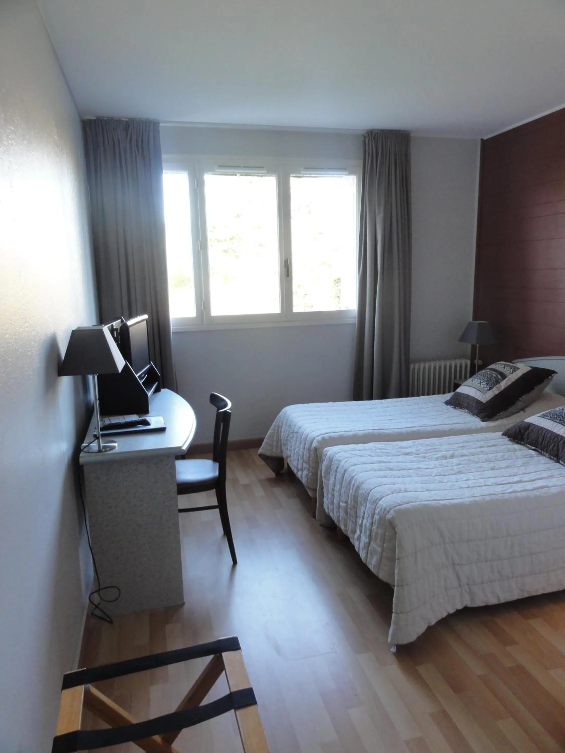 Bed in Hotel La Longue Vue