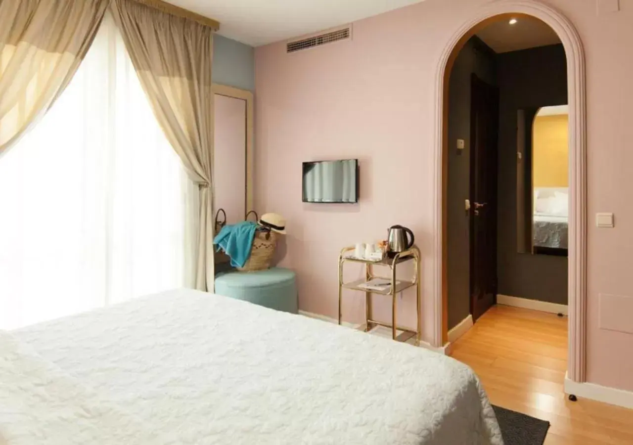 Bedroom, Bed in Hotel Boutique Villa Lorena by Charming Stay Adults Recommended
