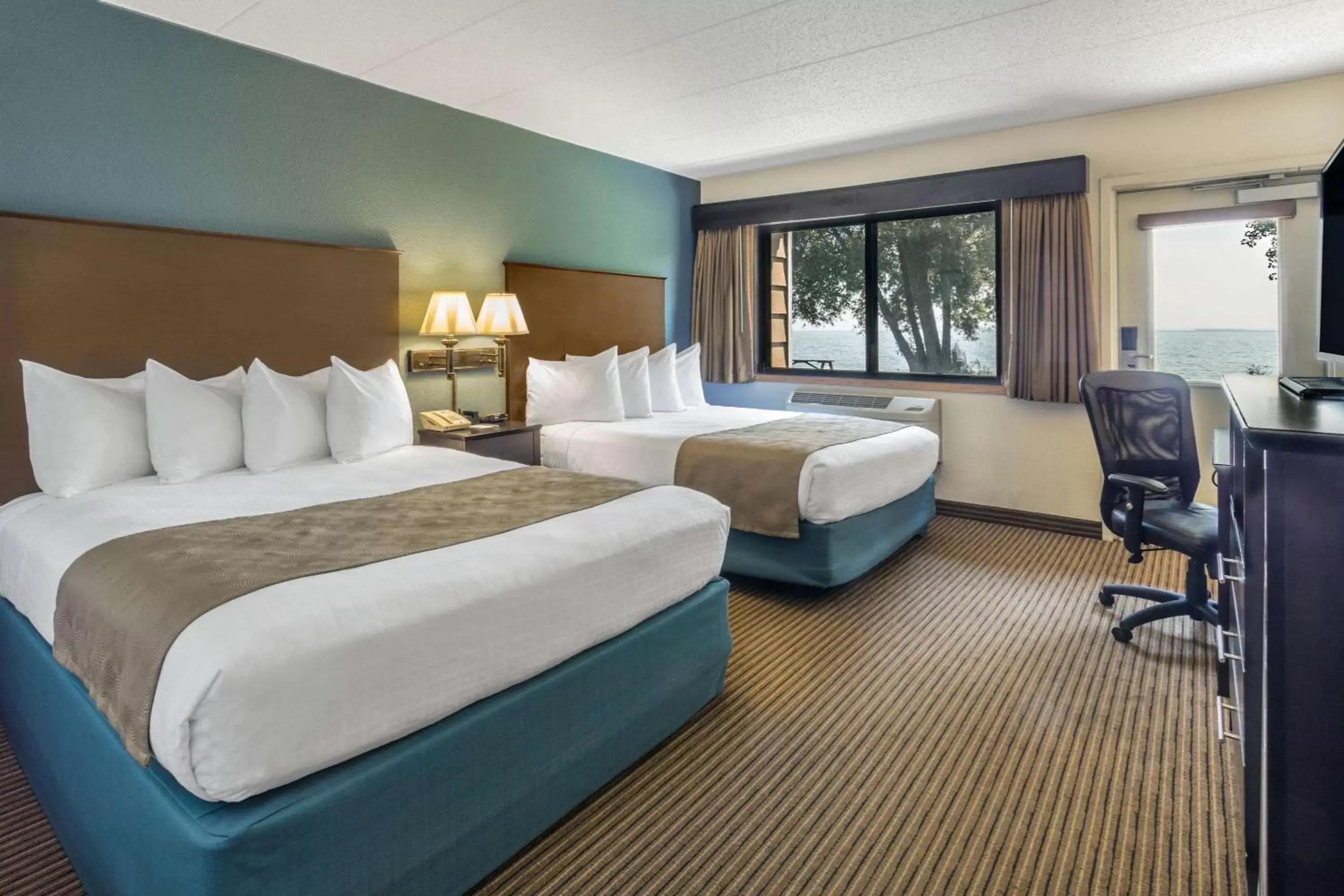 Photo of the whole room, Bed in AmericInn by Wyndham Menominee