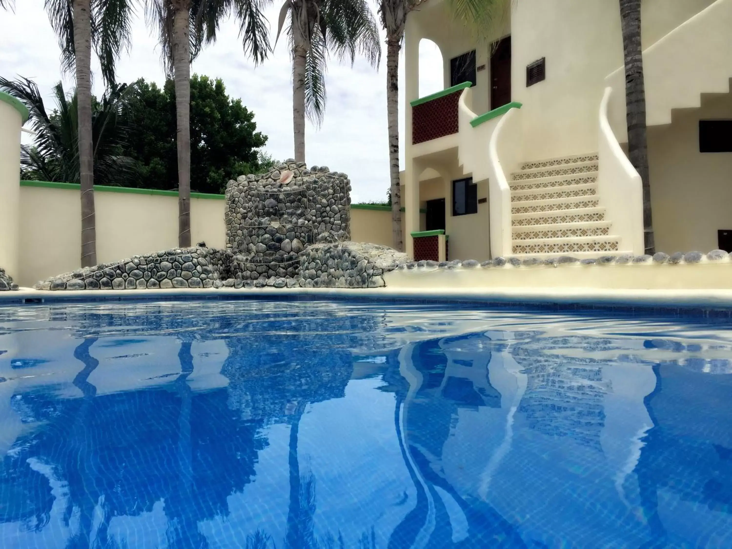 Property building, Swimming Pool in Villas Coco Resort - All Suites