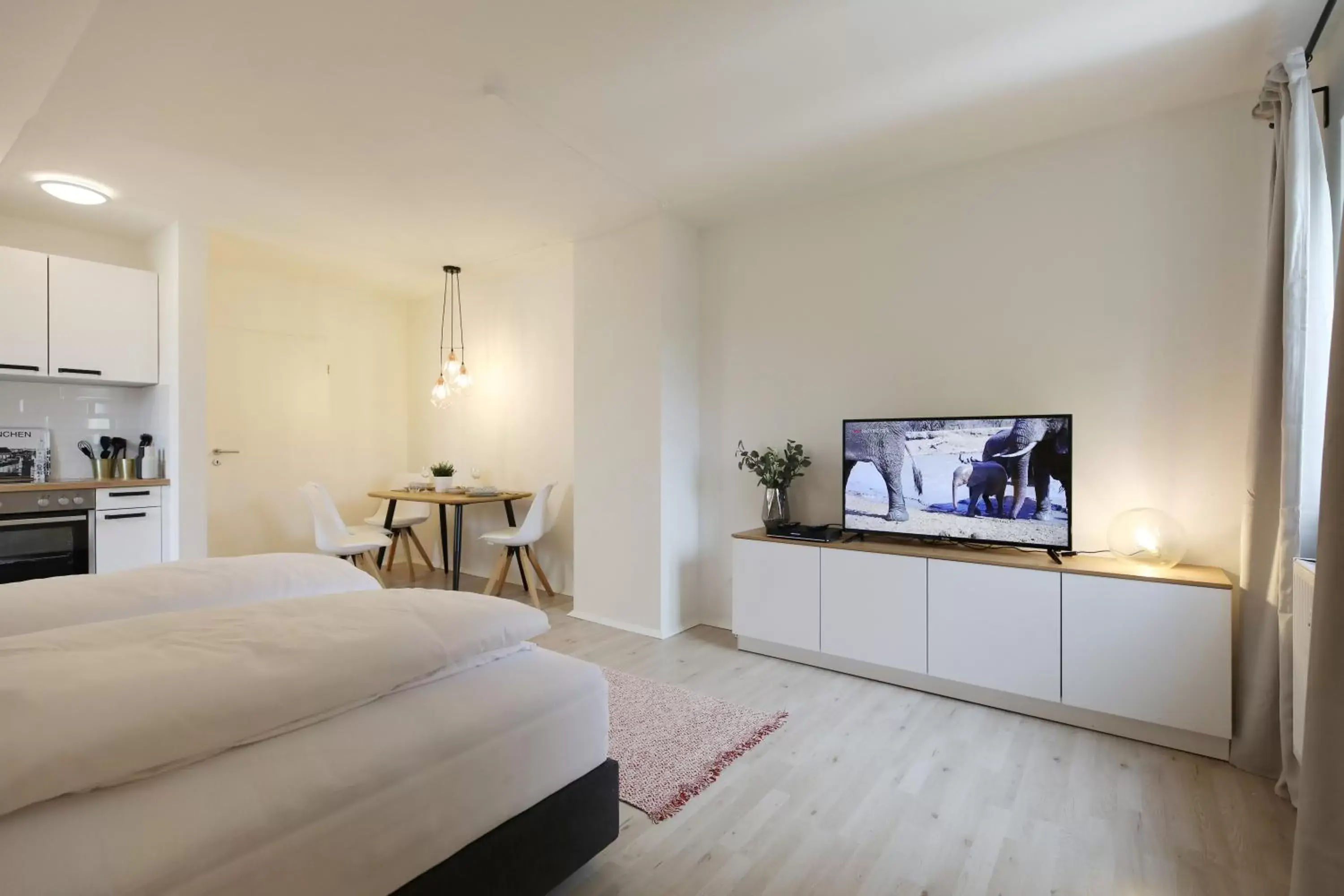 TV and multimedia, TV/Entertainment Center in Hotel Obermaier