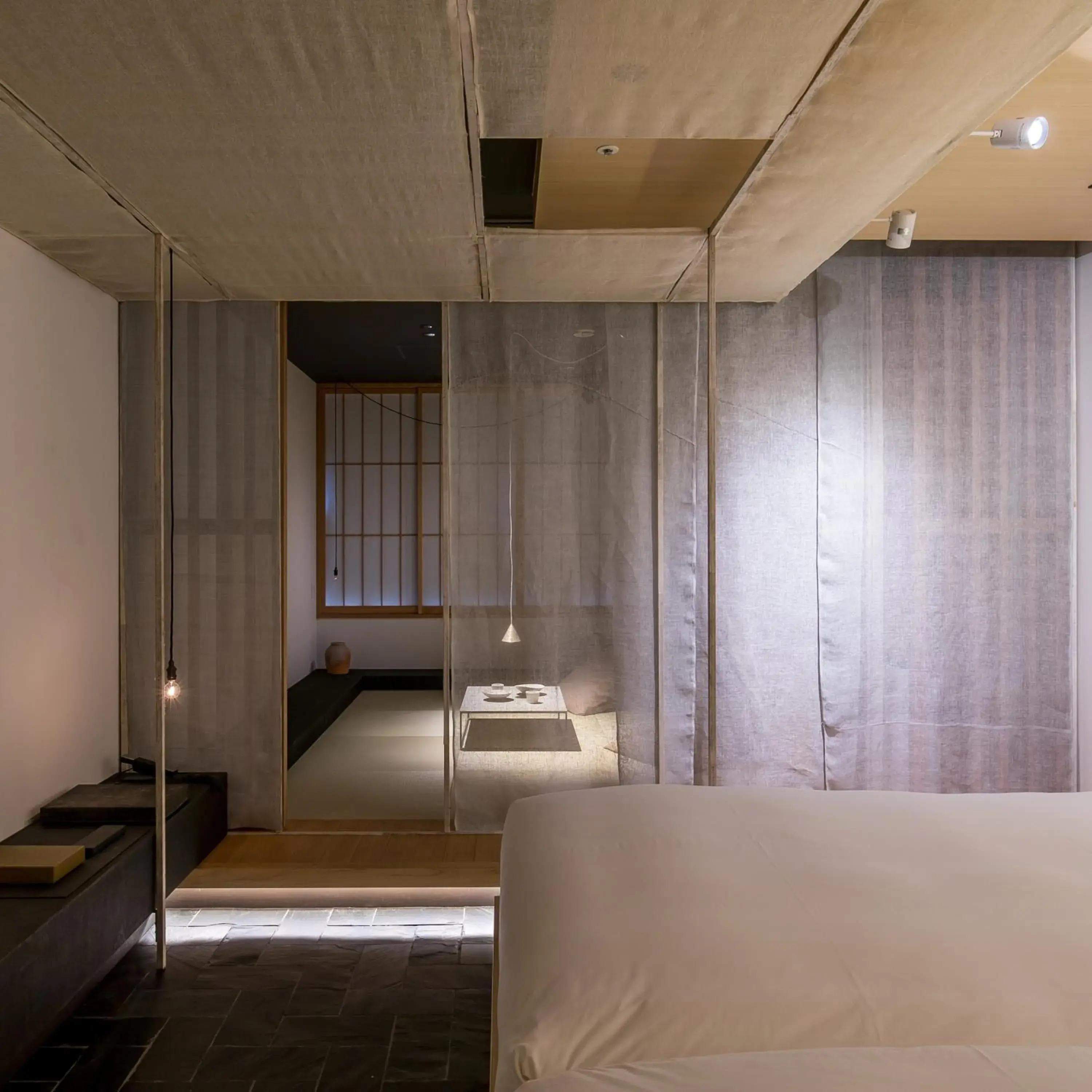Seating area, Bed in hotel kanra kyoto
