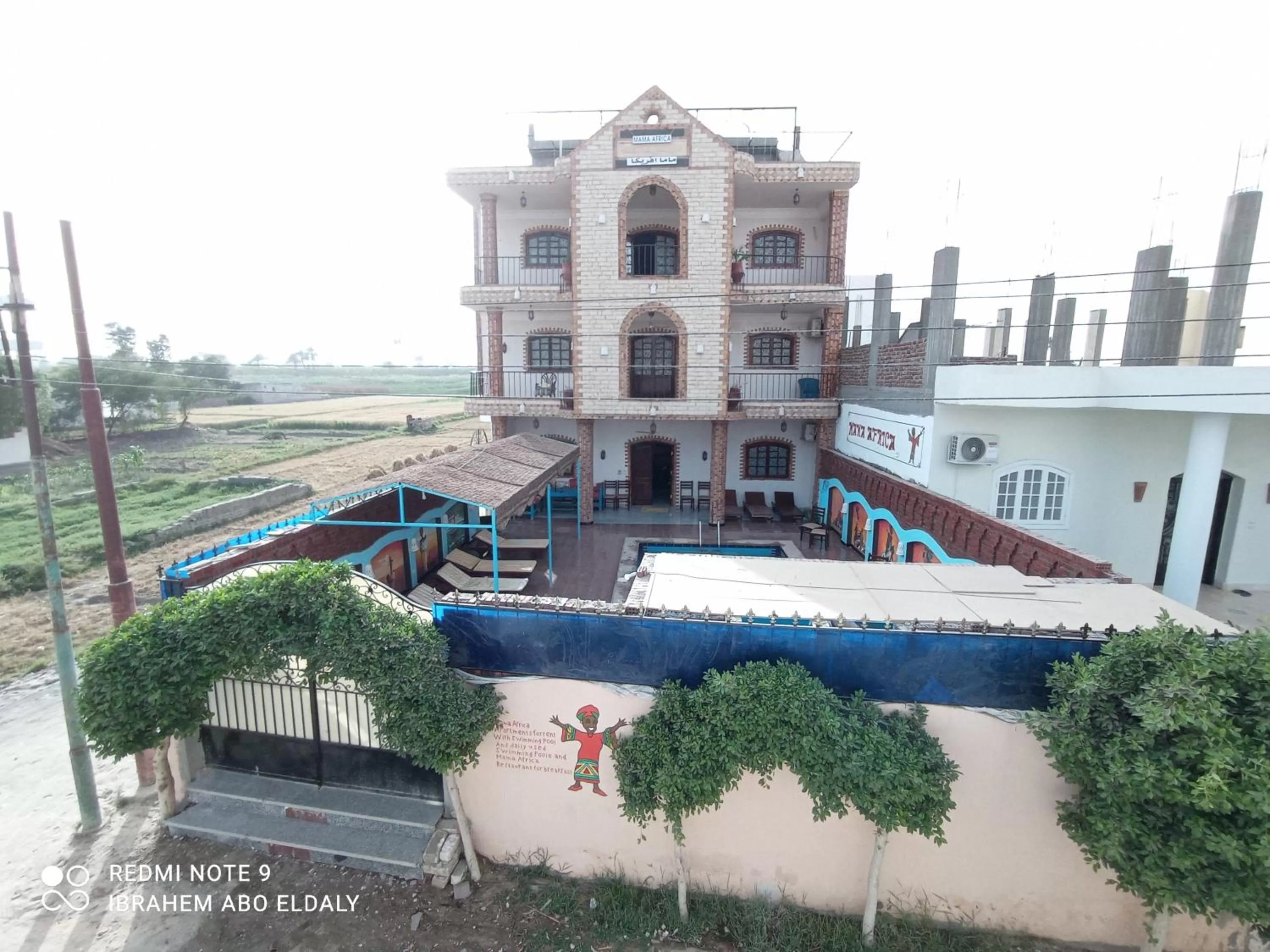 Swimming pool in Mama Africa Apts & Studios