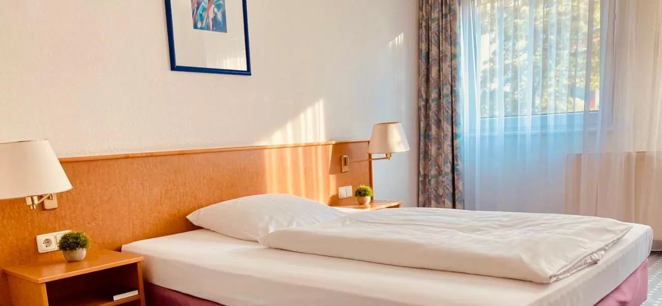 Bed in Akzent Congresshotel Hoyerswerda