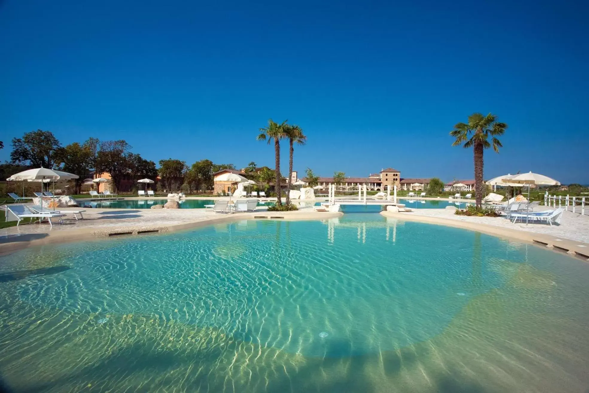 Swimming Pool in Chervò Golf Hotel Spa, Resort & Apartment San Vigilio