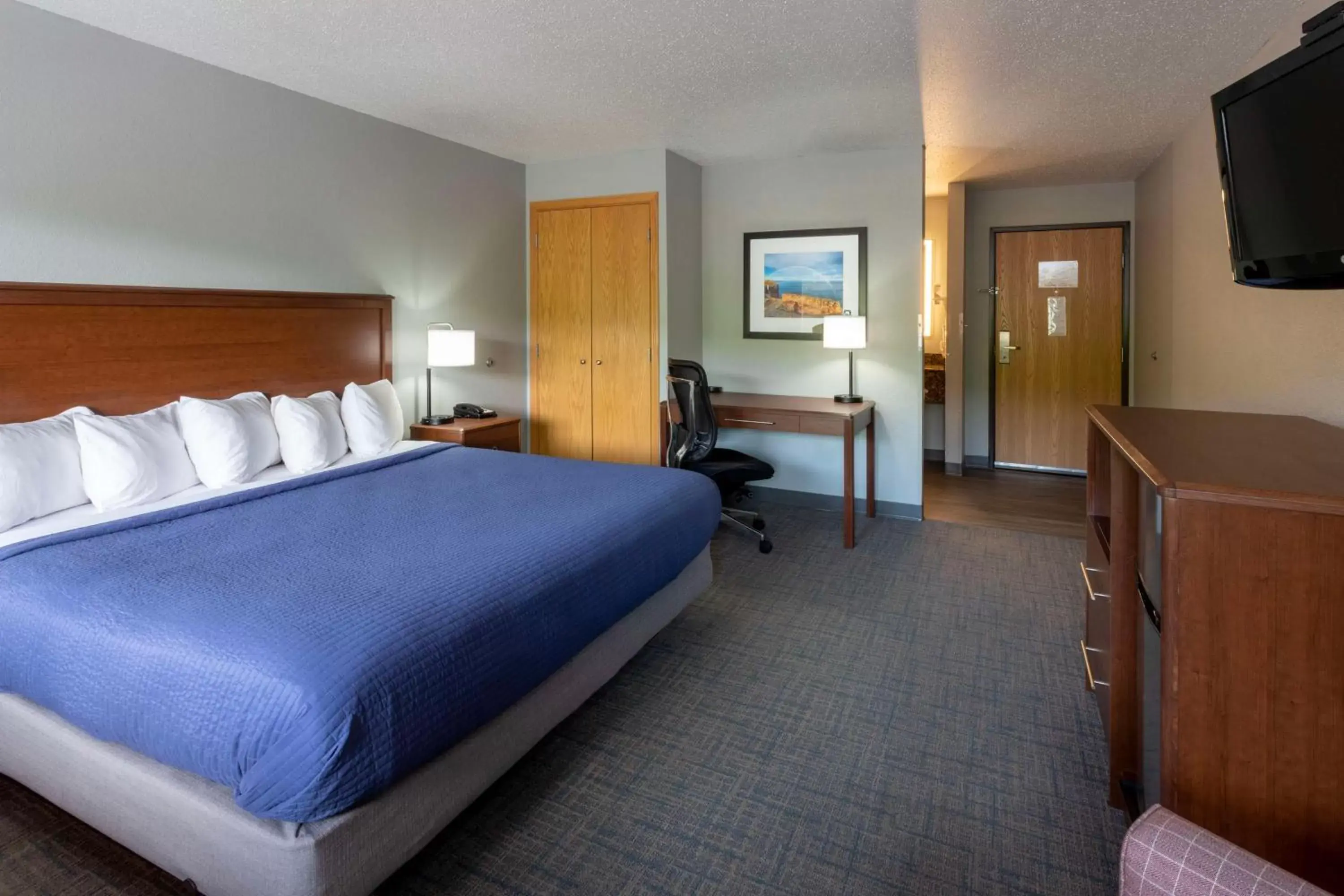 Bedroom, Bed in Black Beach Inn by GrandStay