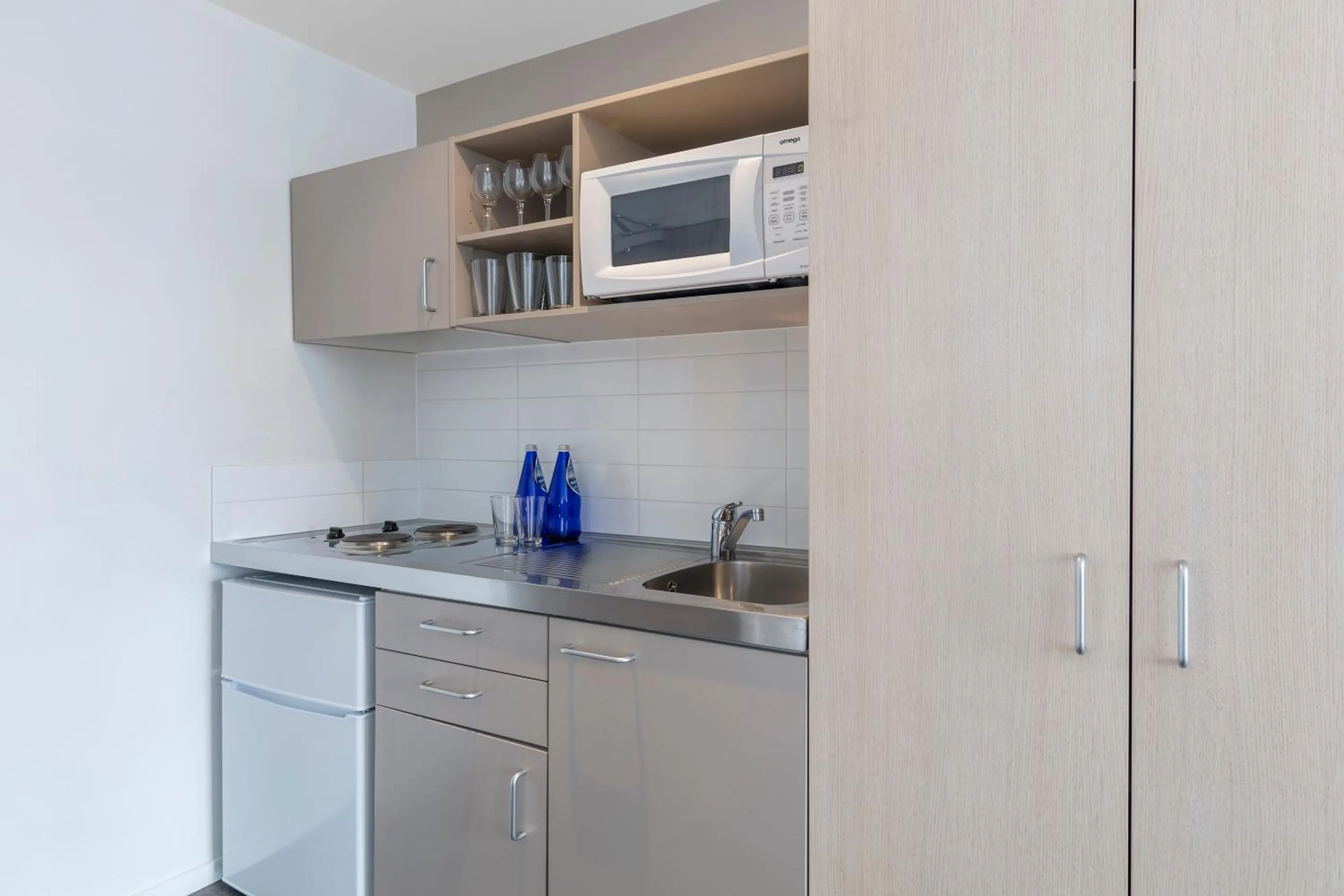 Kitchen or kitchenette in Tetra Serviced Apartments by Castle