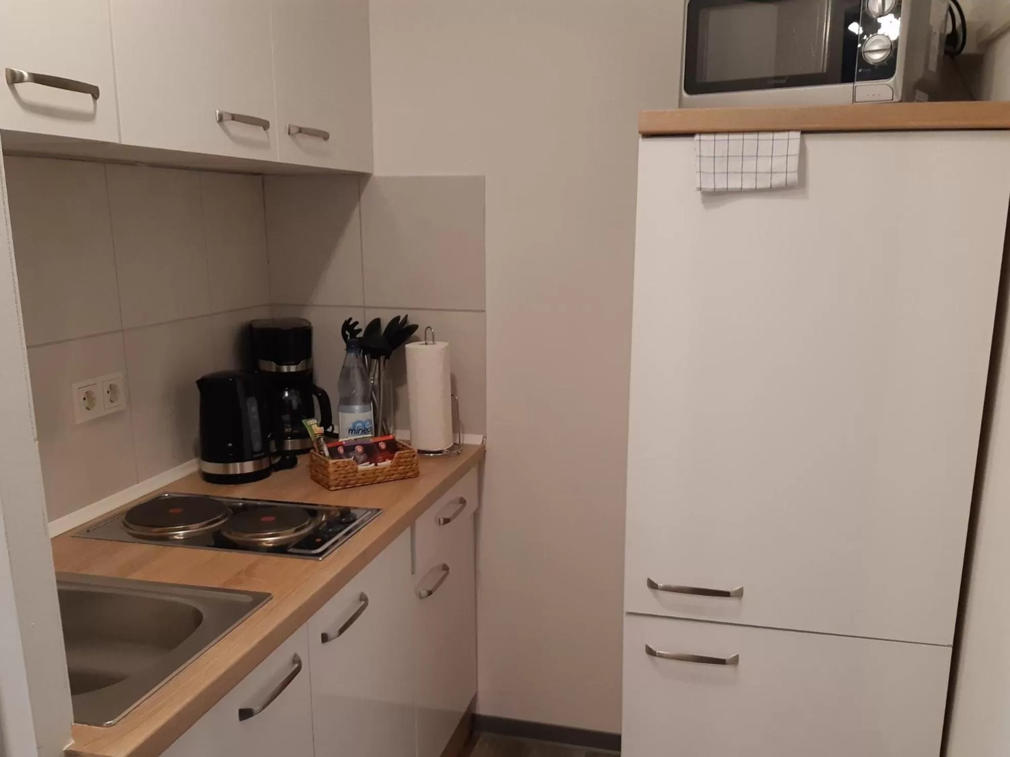 Kitchen or kitchenette in Hotel M24 - Alle Zimmer mit Küchenzeile
