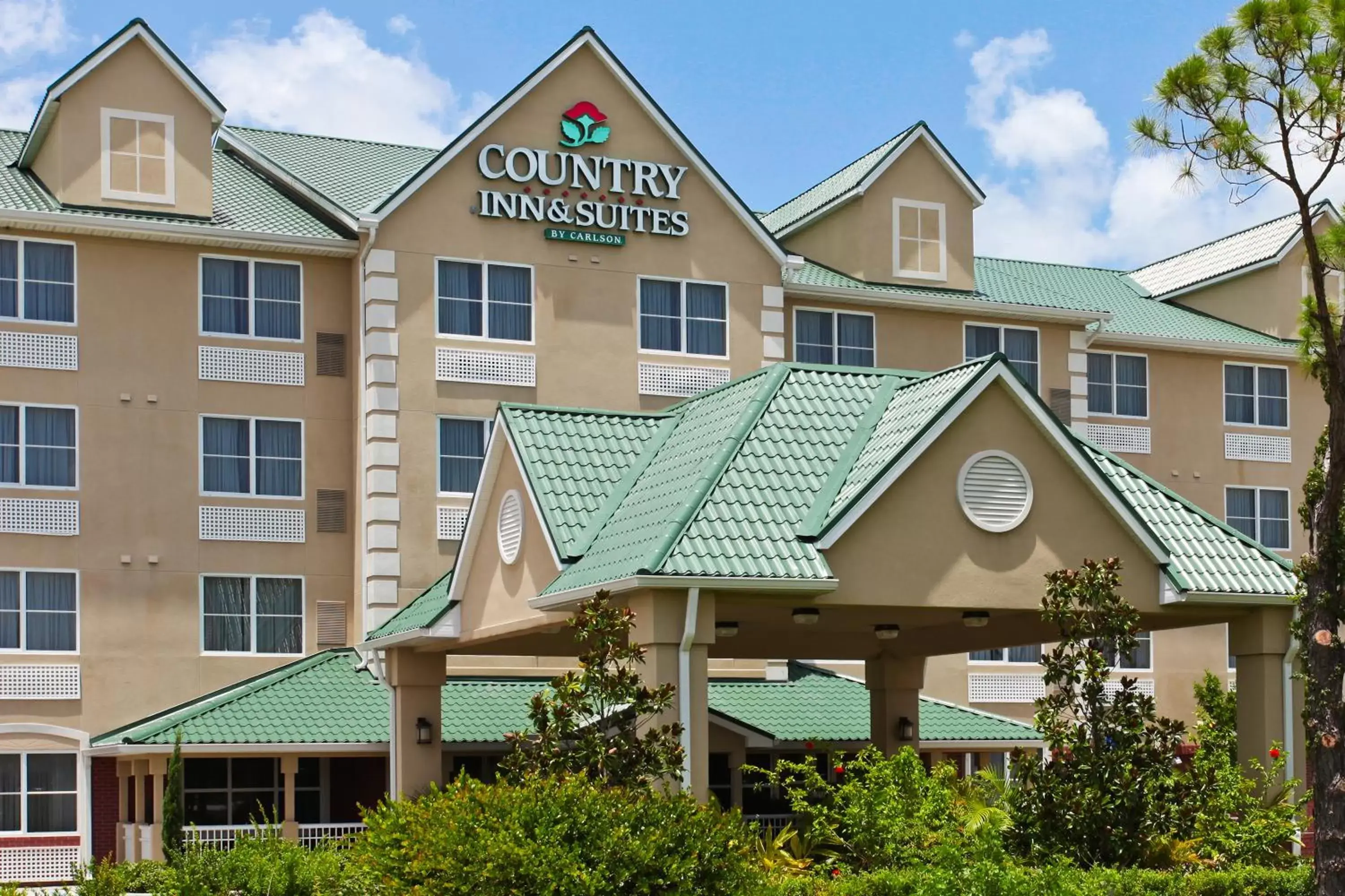Facade/entrance, Property Building in Country Inn & Suites by Radisson, Port Charlotte, FL