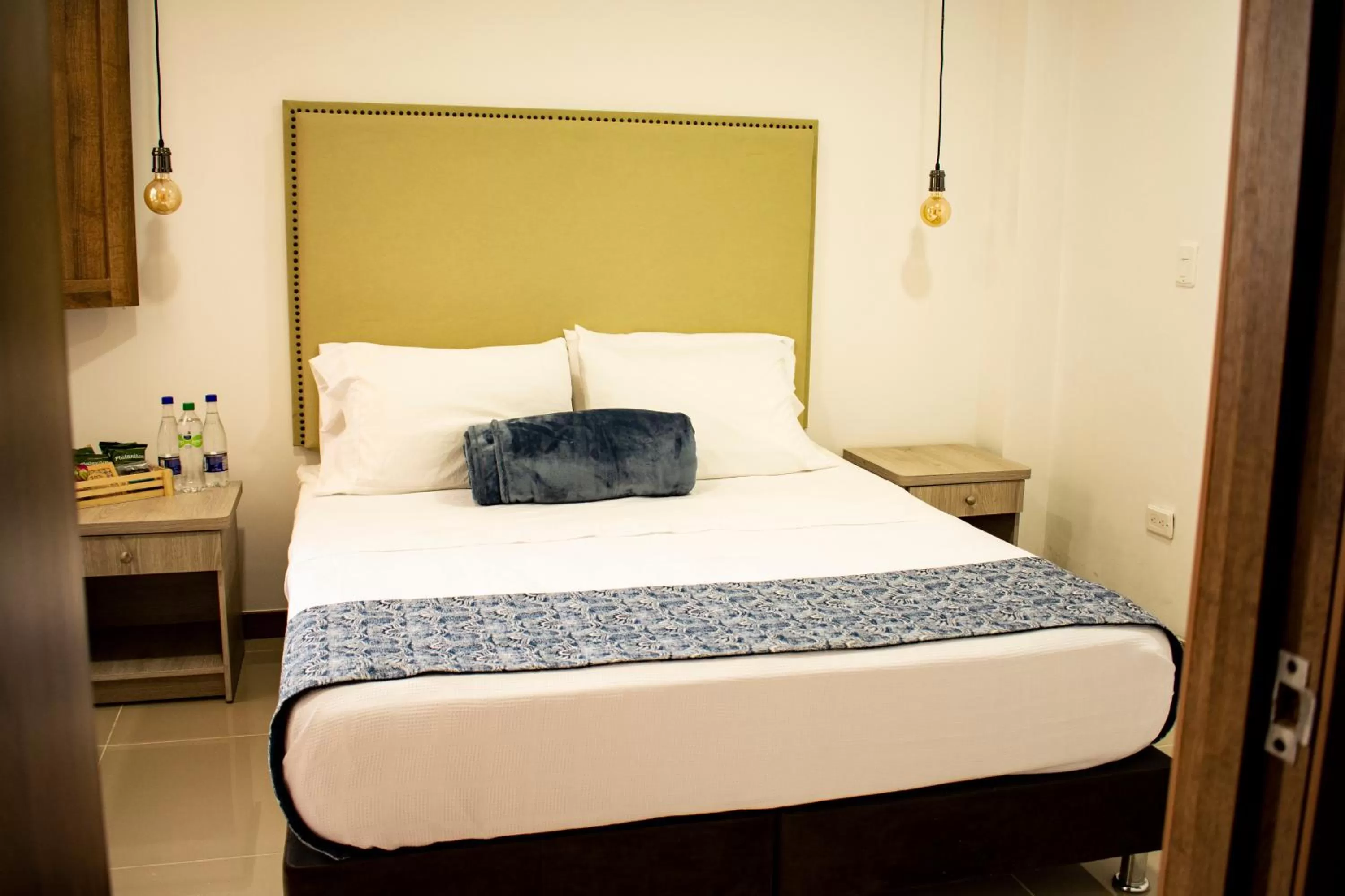 Bed in El Reloj Casa Hotel